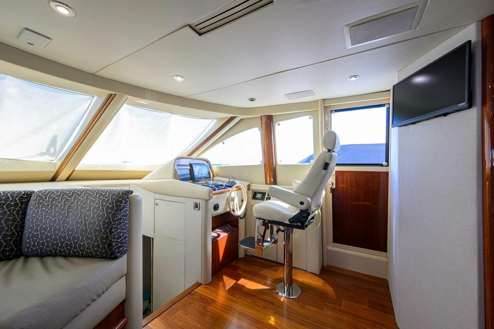 a room with a couch and a desk aboard ALWAYS BAREFOOT Yacht for Sale