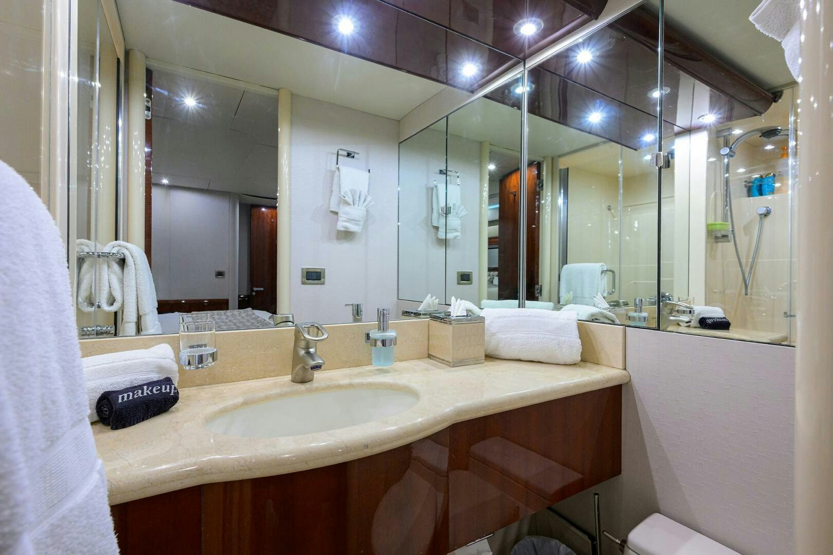 a bathroom with a large mirror aboard ALWAYS BAREFOOT Yacht for Sale