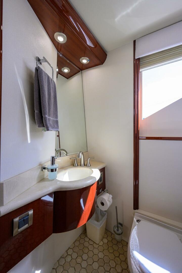 a bathroom with a sink and a toilet aboard ALWAYS BAREFOOT Yacht for Sale
