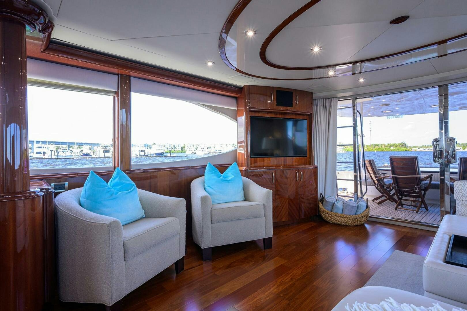 a living room with a large window aboard ALWAYS BAREFOOT Yacht for Sale