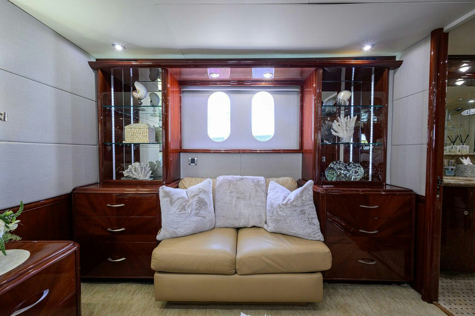 a living room with a couch and a mirror aboard ALWAYS BAREFOOT Yacht for Sale