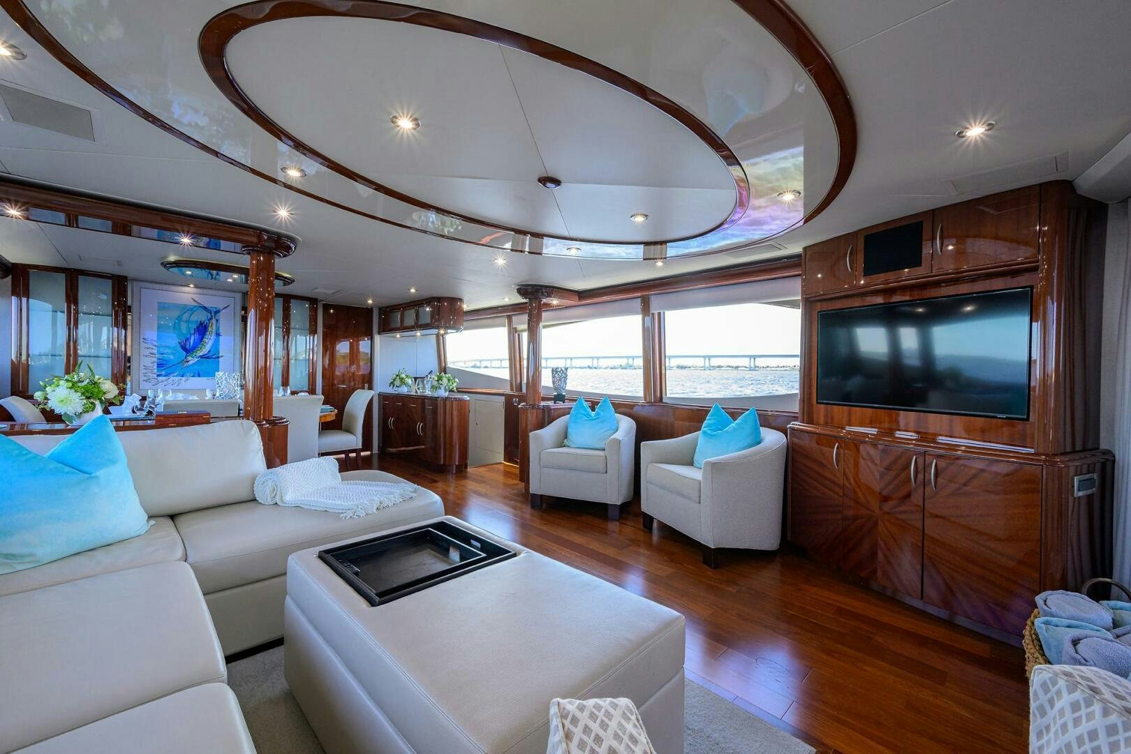 a living room with a large television aboard ALWAYS BAREFOOT Yacht for Sale