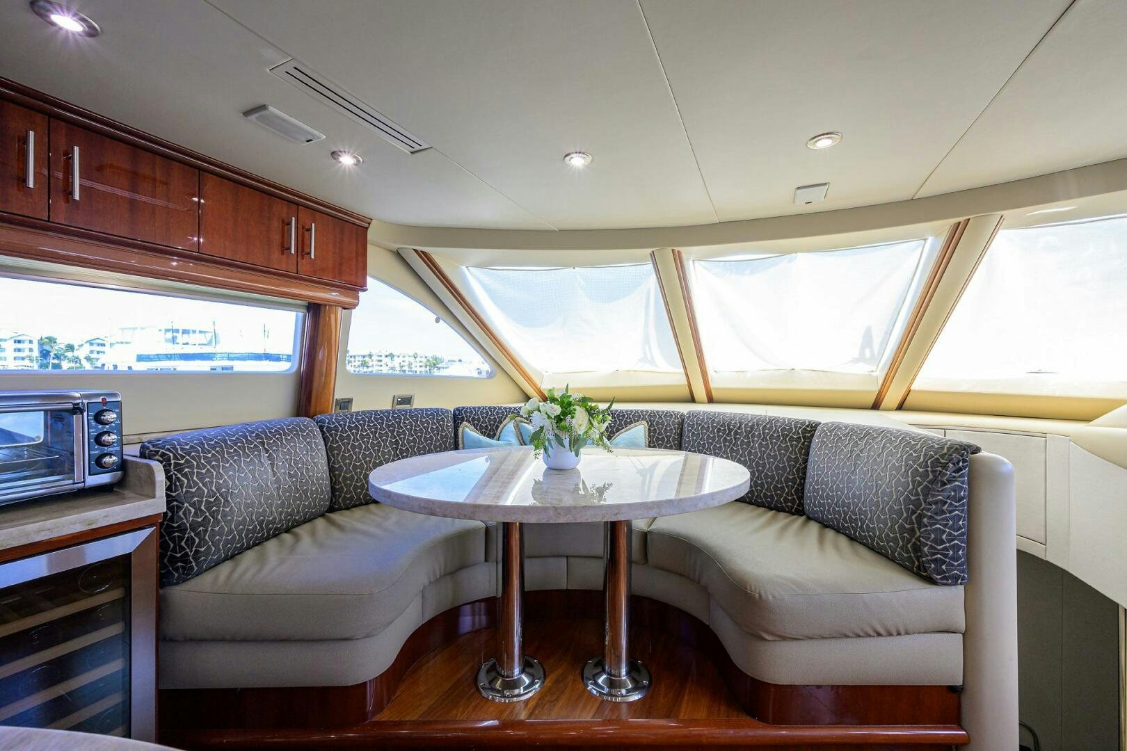 a living room with a couch and a table aboard ALWAYS BAREFOOT Yacht for Sale