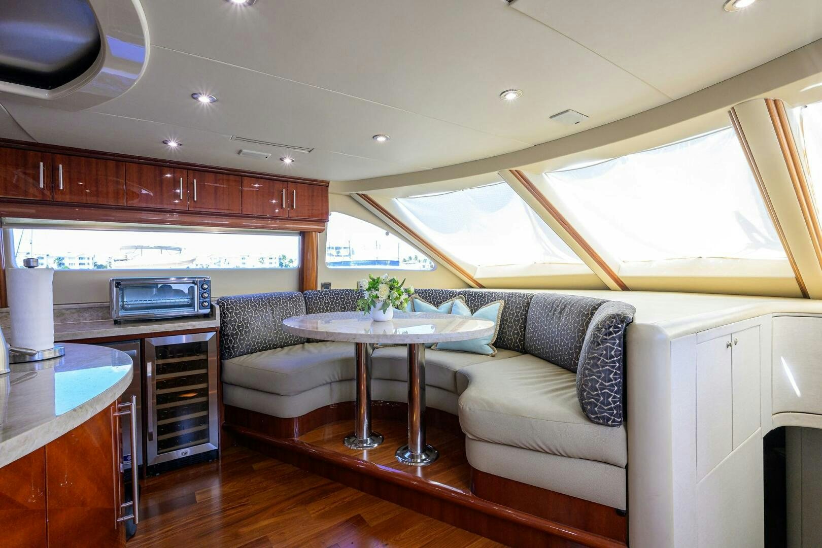 a living room with a couch and a table aboard ALWAYS BAREFOOT Yacht for Sale