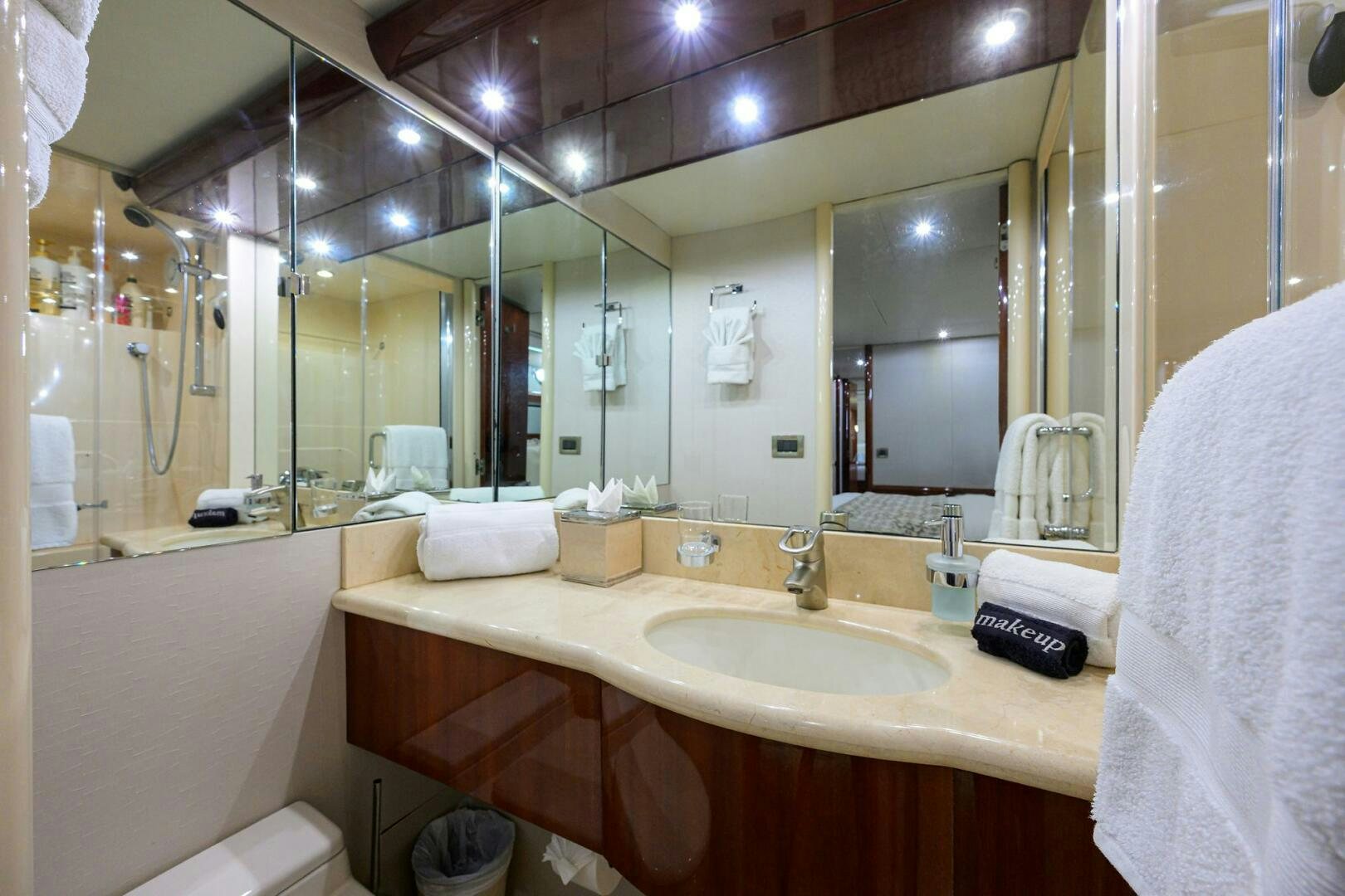 a bathroom with a large mirror aboard ALWAYS BAREFOOT Yacht for Sale