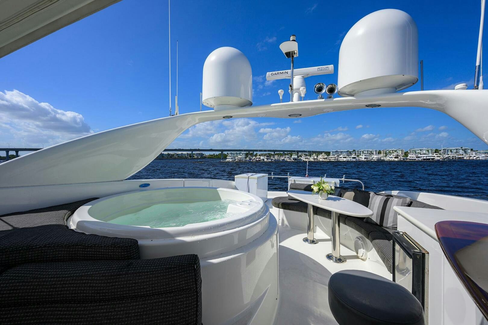 a large white ship with a large white building in the background aboard ALWAYS BAREFOOT Yacht for Sale
