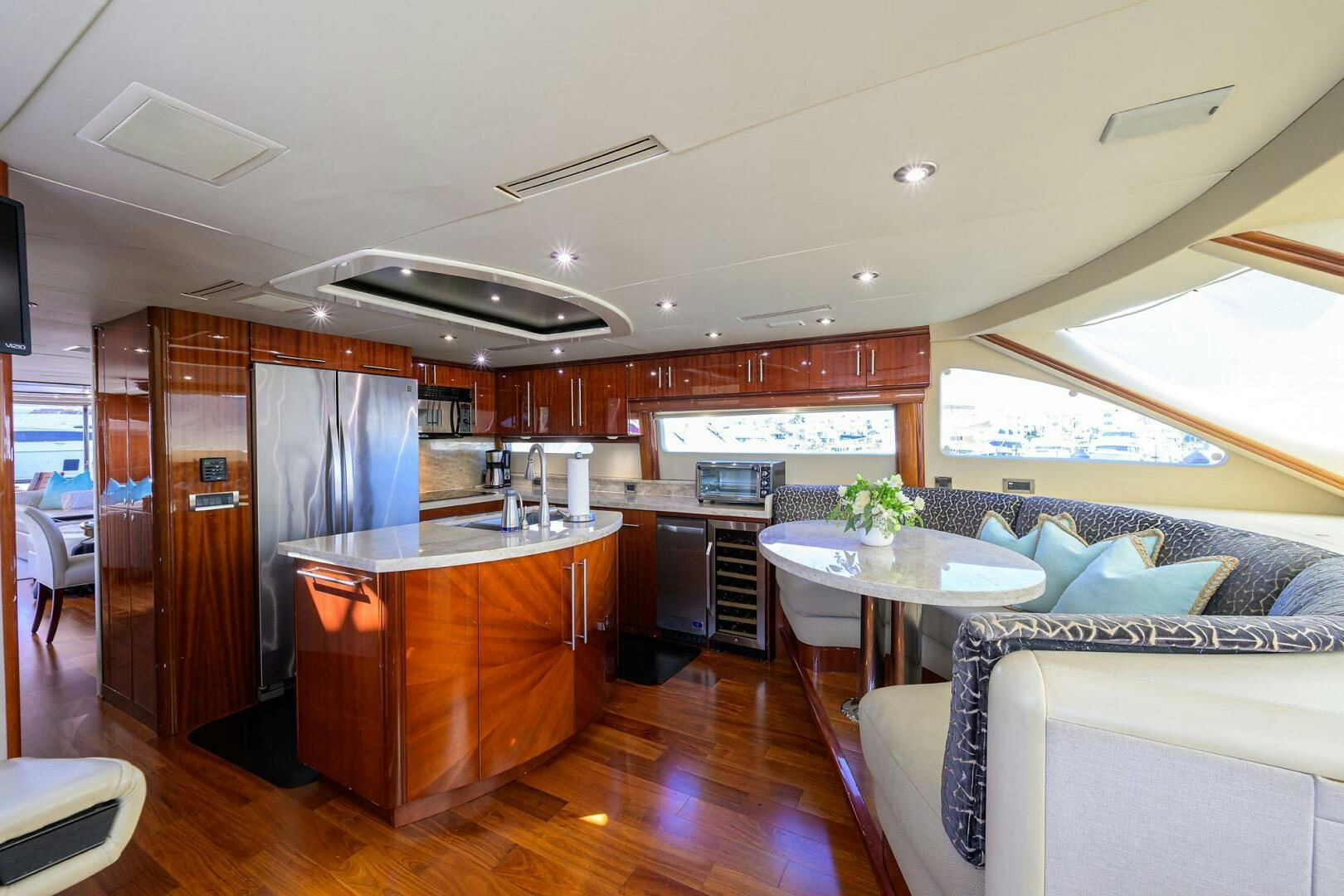 a kitchen with a table and a couch aboard ALWAYS BAREFOOT Yacht for Sale