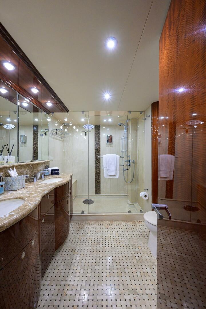 a bathroom with a shower and sink aboard ALWAYS BAREFOOT Yacht for Sale