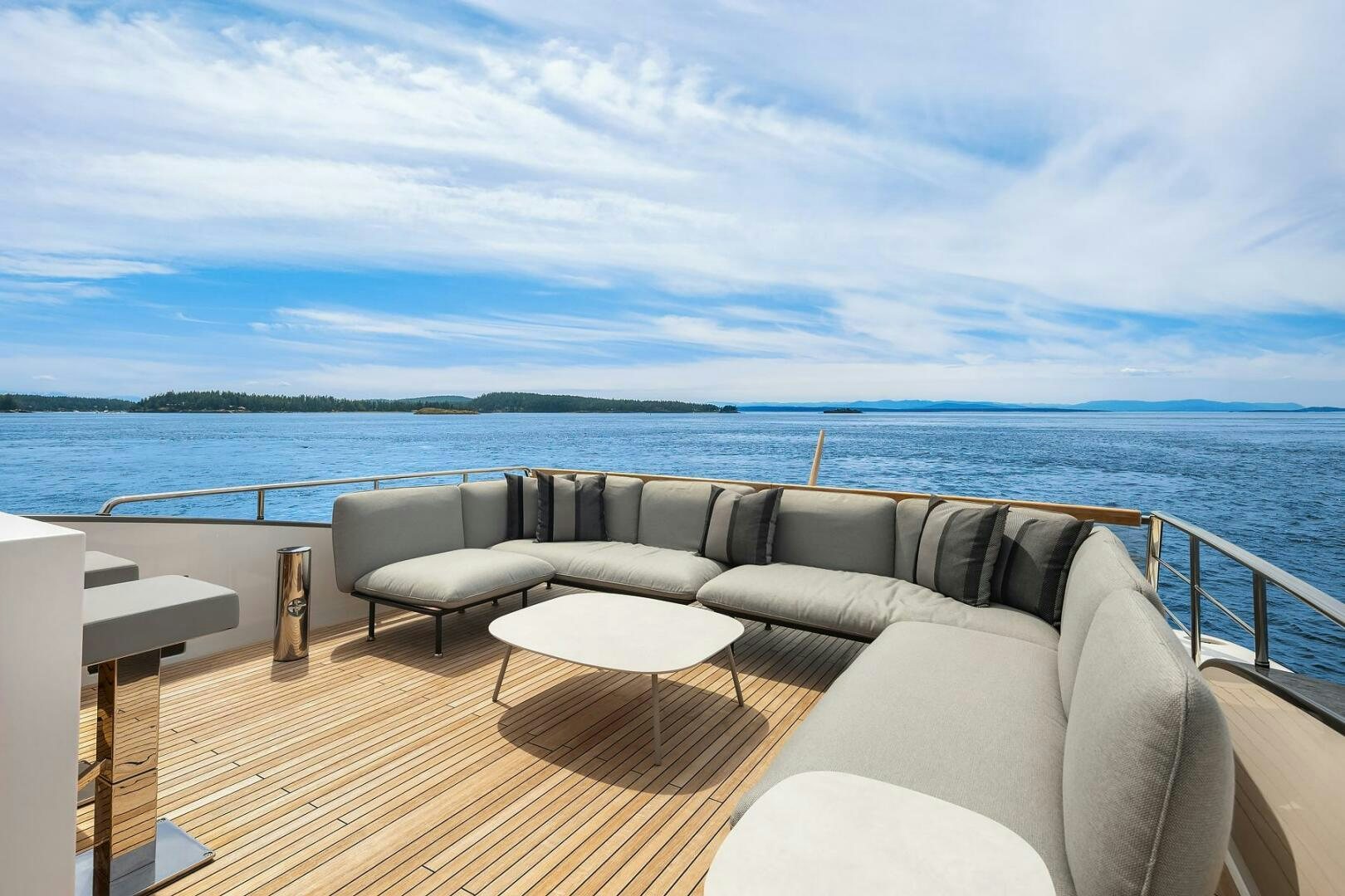 a large living room with a large body of water aboard SANLORENZO SL86 Yacht for Sale