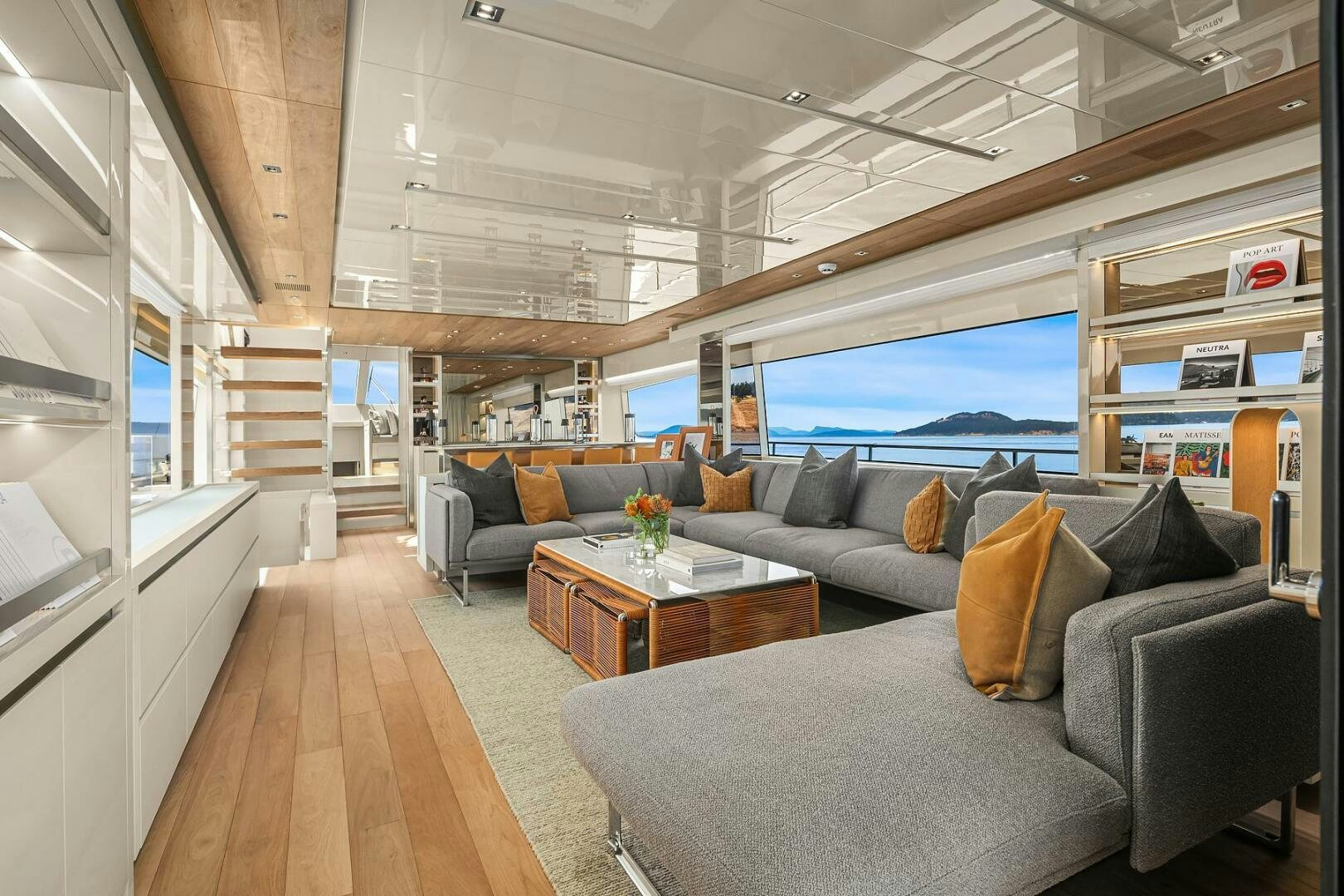 a living room with a large window aboard SANLORENZO SL86 Yacht for Sale