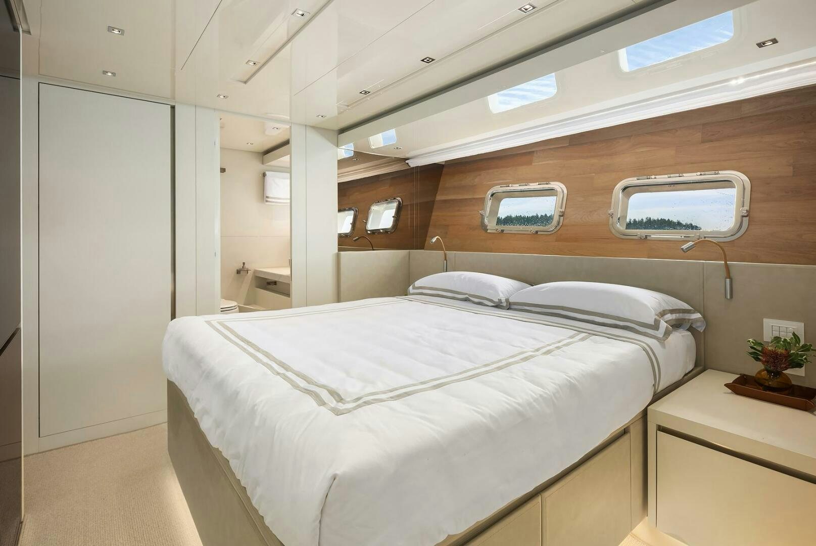 a room with two beds aboard SANLORENZO SL86 Yacht for Sale