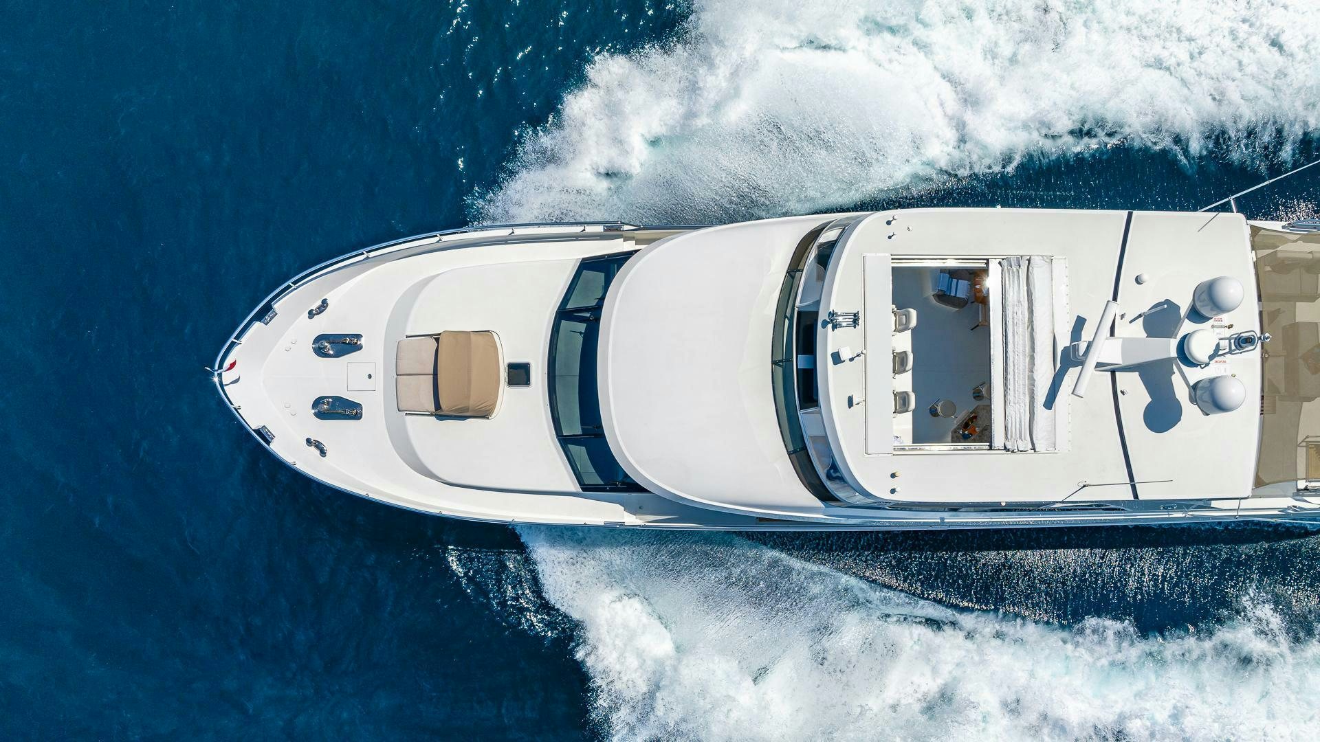 a white house on a snowy hill aboard NOW WE KNOW Yacht for Sale