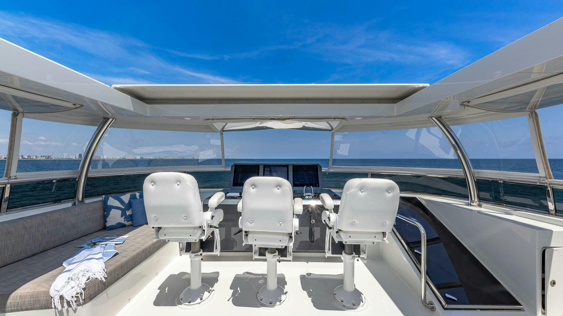 a boat with chairs on it aboard NOW WE KNOW Yacht for Sale