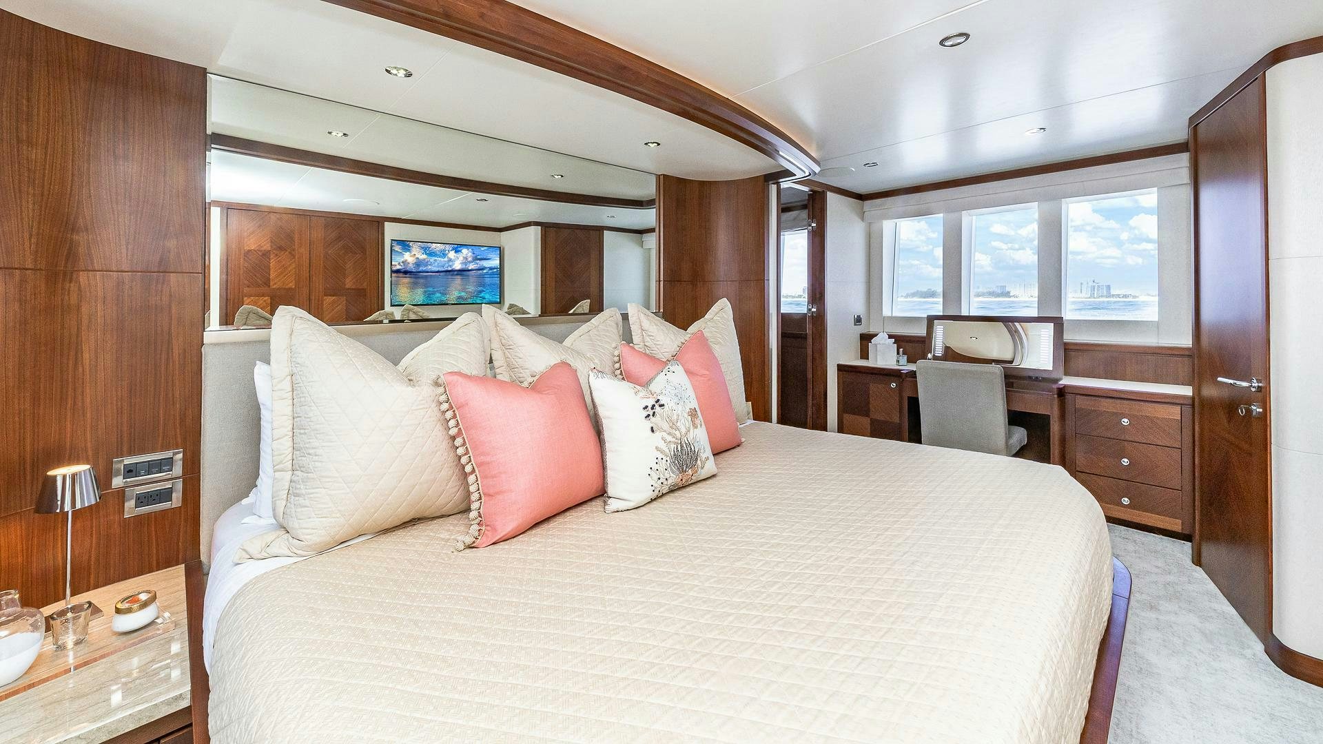 a bed with pillows on it aboard NOW WE KNOW Yacht for Sale