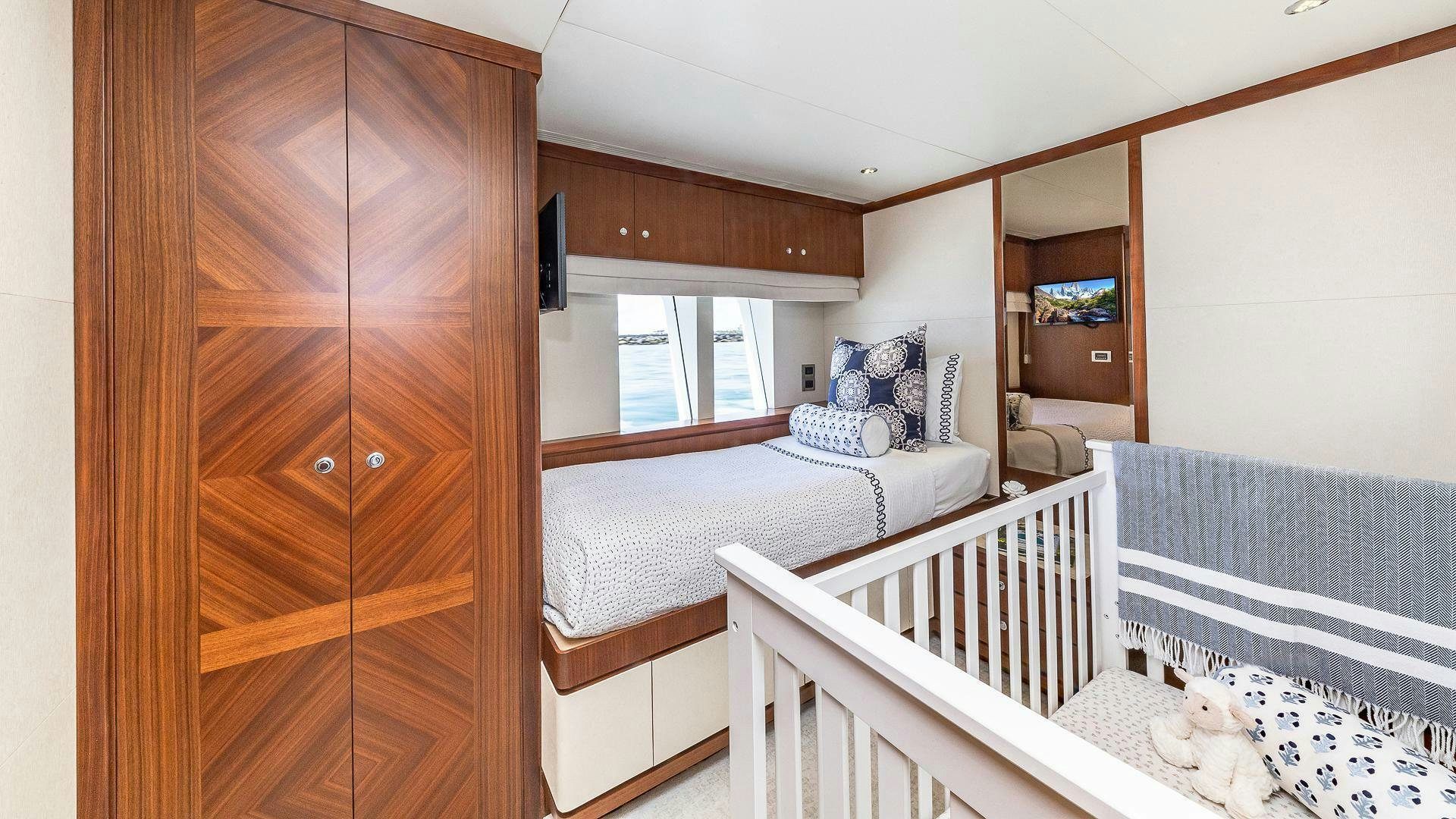a room with two beds aboard NOW WE KNOW Yacht for Sale