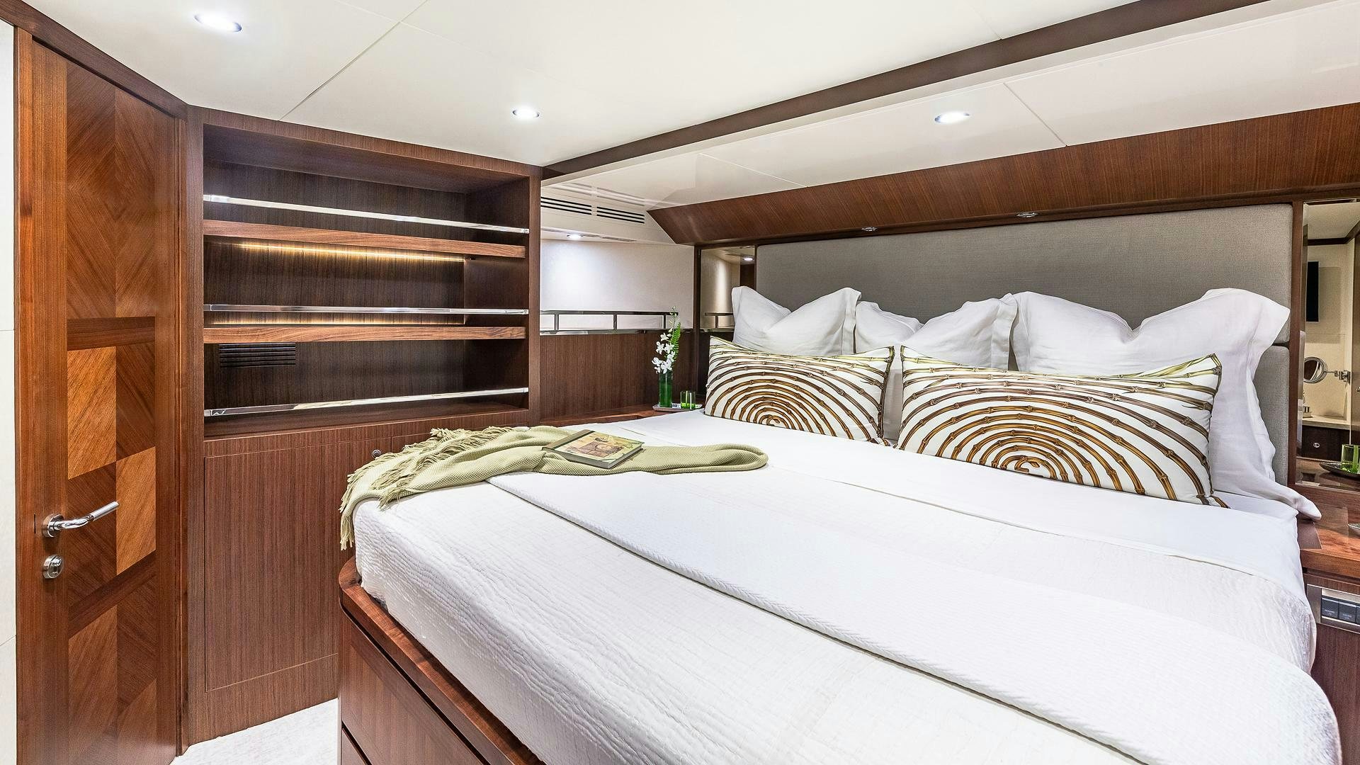 a bed with white sheets aboard NOW WE KNOW Yacht for Sale