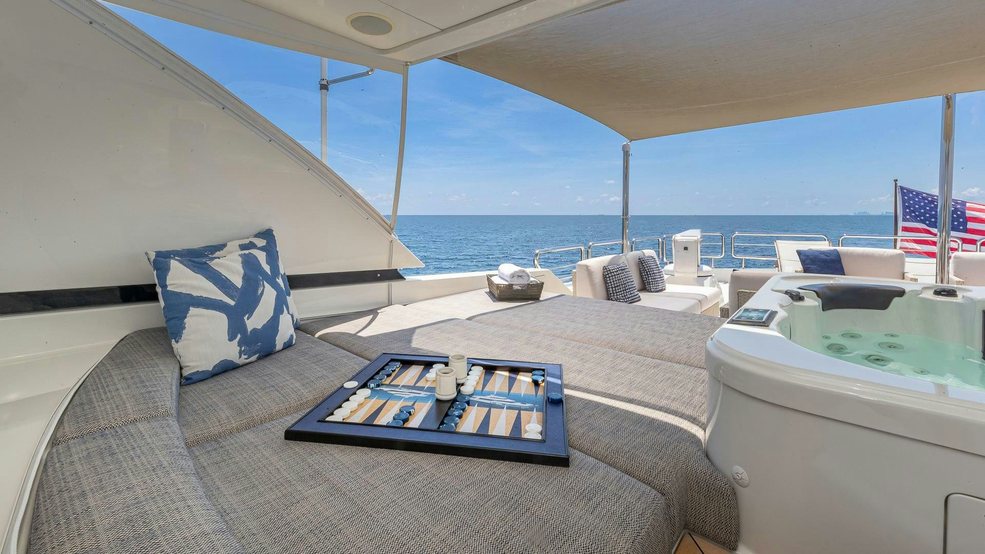 a bed with a rug on it aboard NOW WE KNOW Yacht for Sale