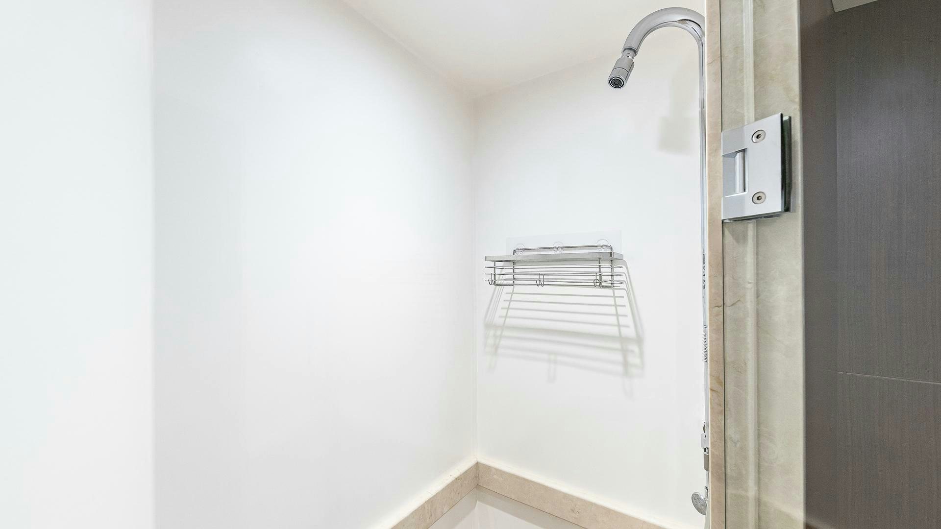 a shower with a white wall aboard NOW WE KNOW Yacht for Sale