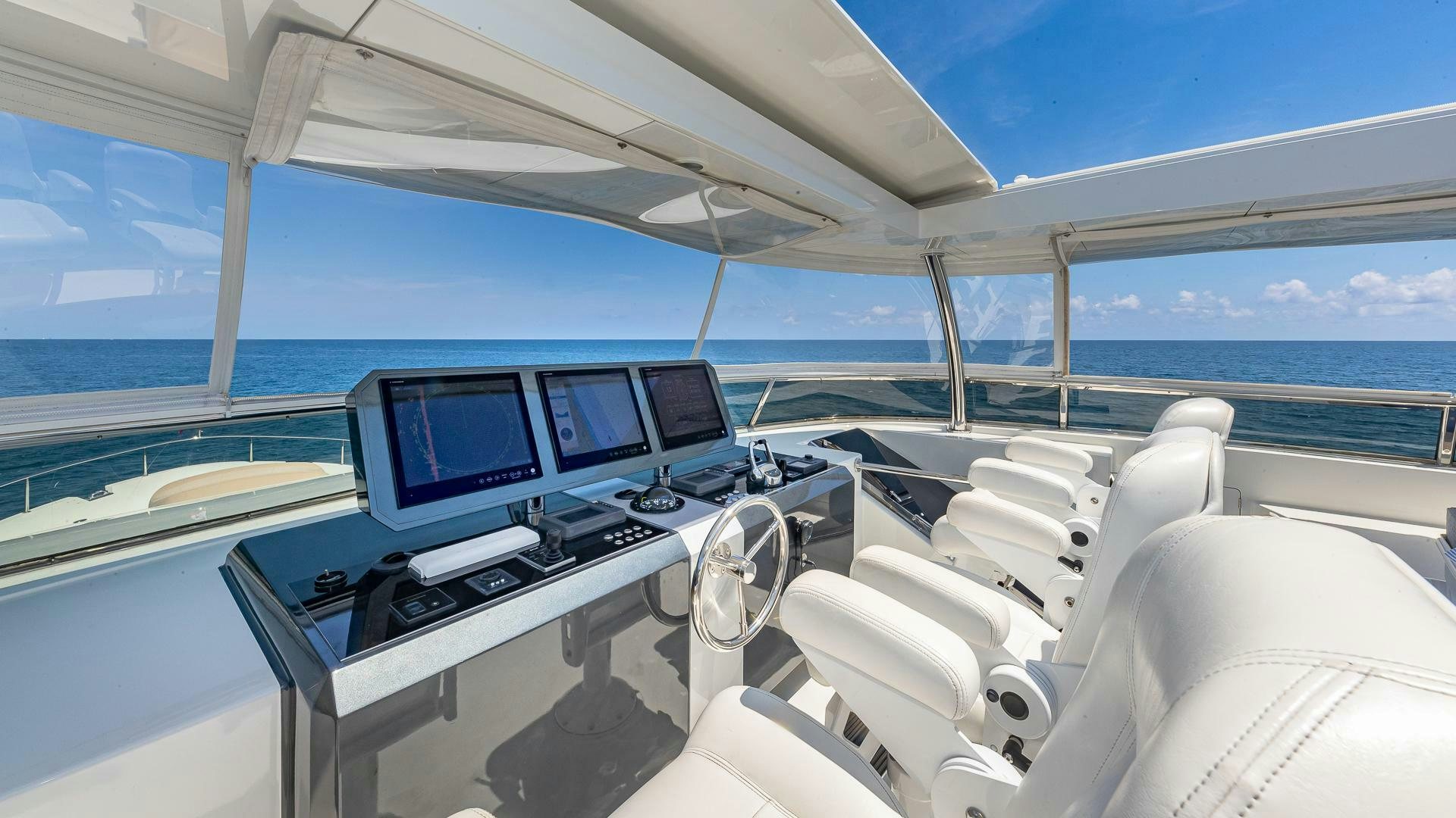 a large white yacht with many computers aboard NOW WE KNOW Yacht for Sale