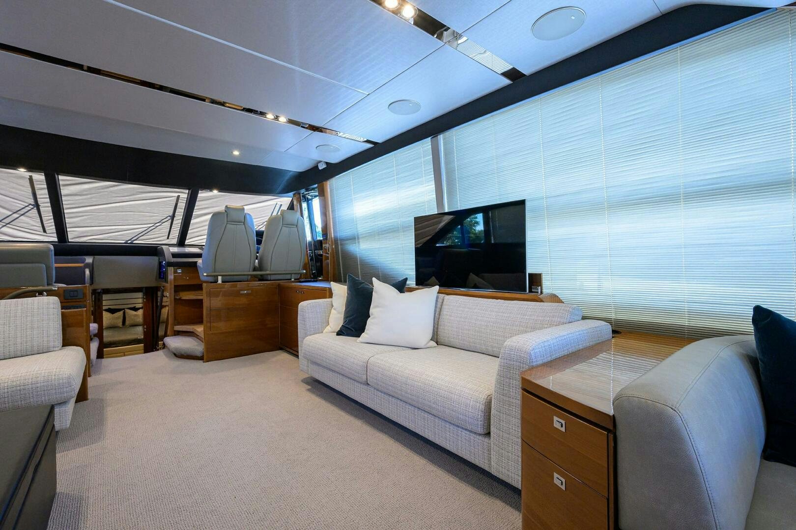 a room with a couch and a tv aboard TWIST OF FAITH Yacht for Sale