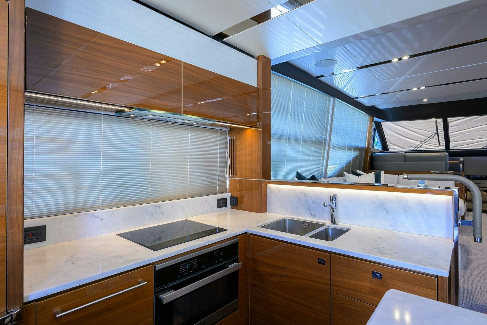 a kitchen with a large window aboard TWIST OF FAITH Yacht for Sale