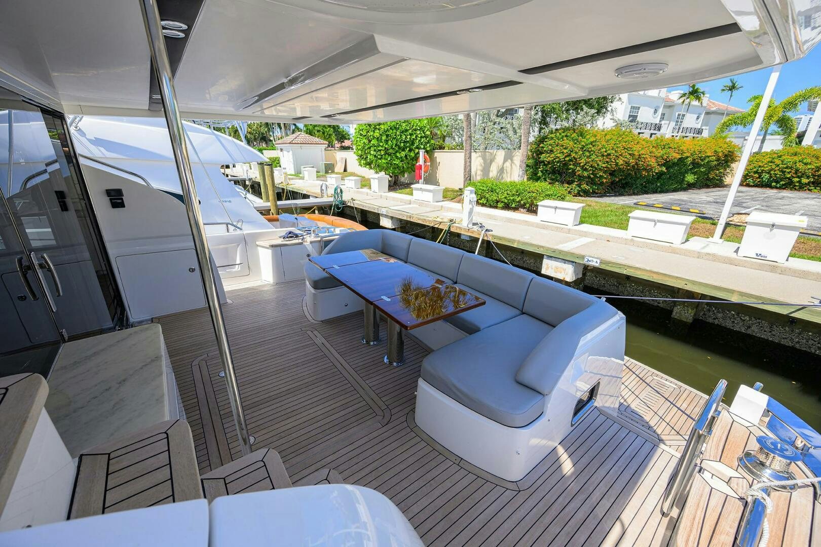a large lounge area with a pool aboard TWIST OF FAITH Yacht for Sale
