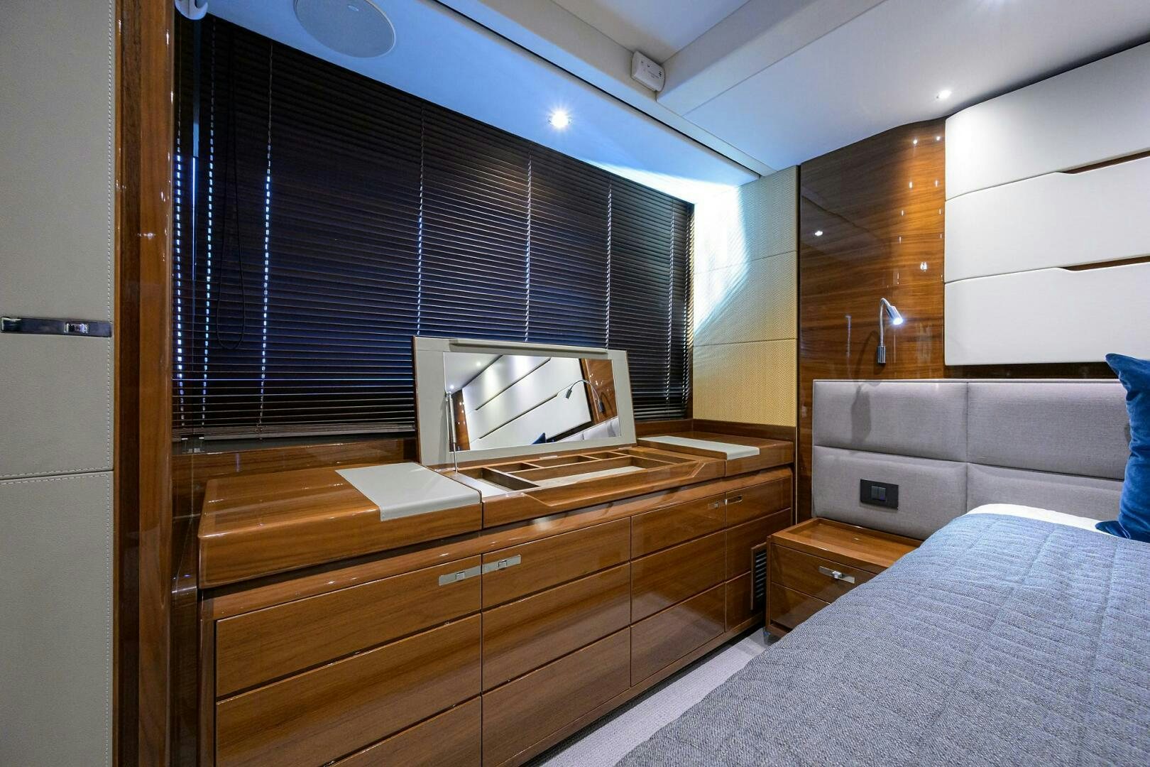 a bedroom with a bed and a television aboard TWIST OF FAITH Yacht for Sale