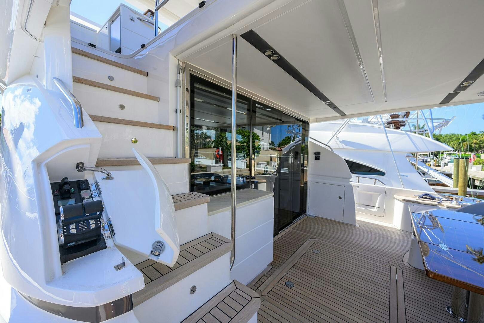 a room with a deck and a pool table aboard TWIST OF FAITH Yacht for Sale