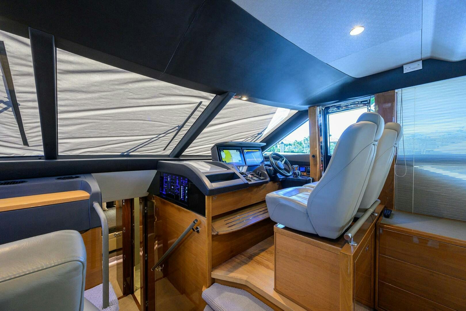 inside of a vehicle with desks and chairs aboard TWIST OF FAITH Yacht for Sale