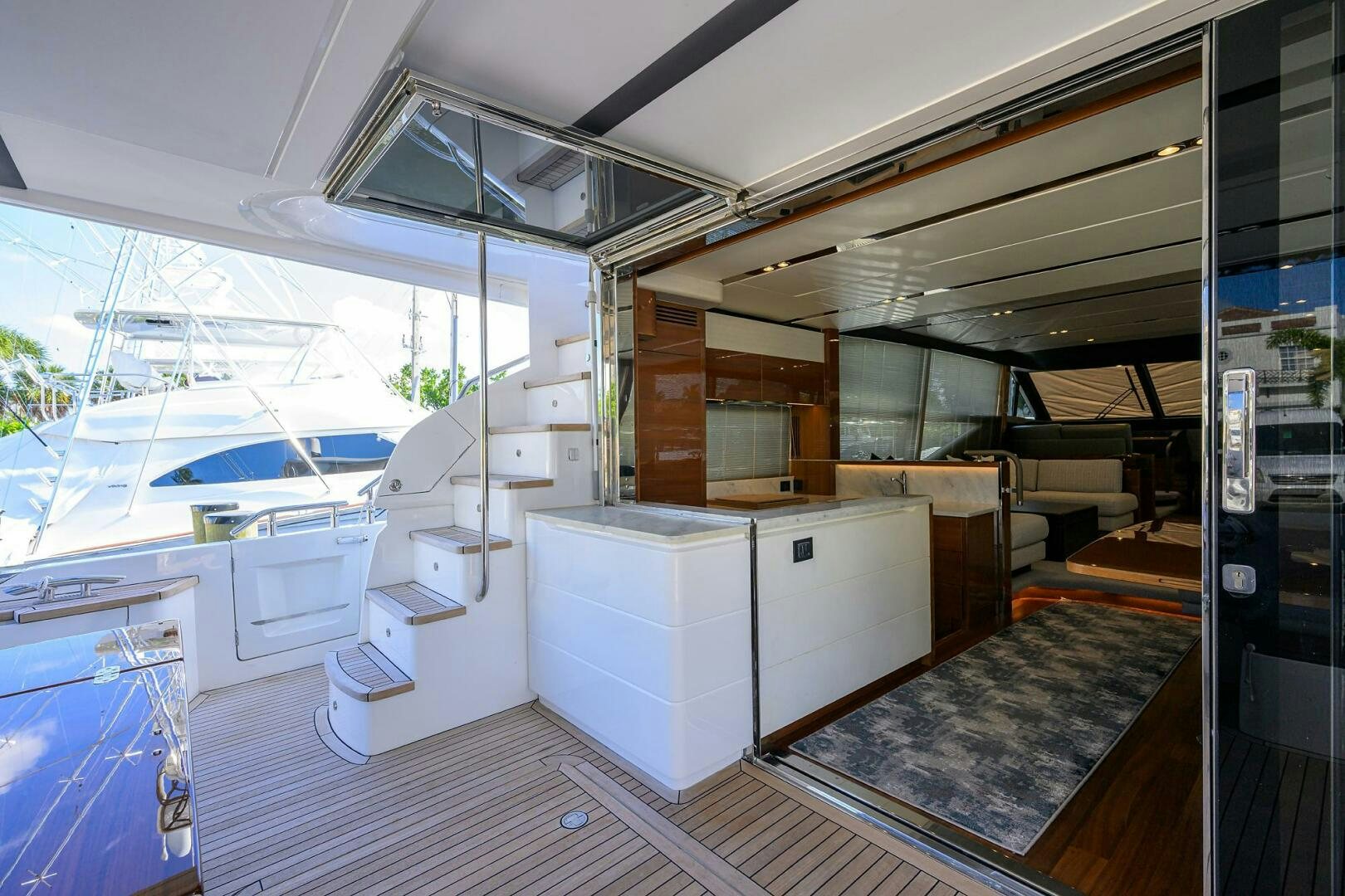 a room with a large window and a large open door aboard TWIST OF FAITH Yacht for Sale