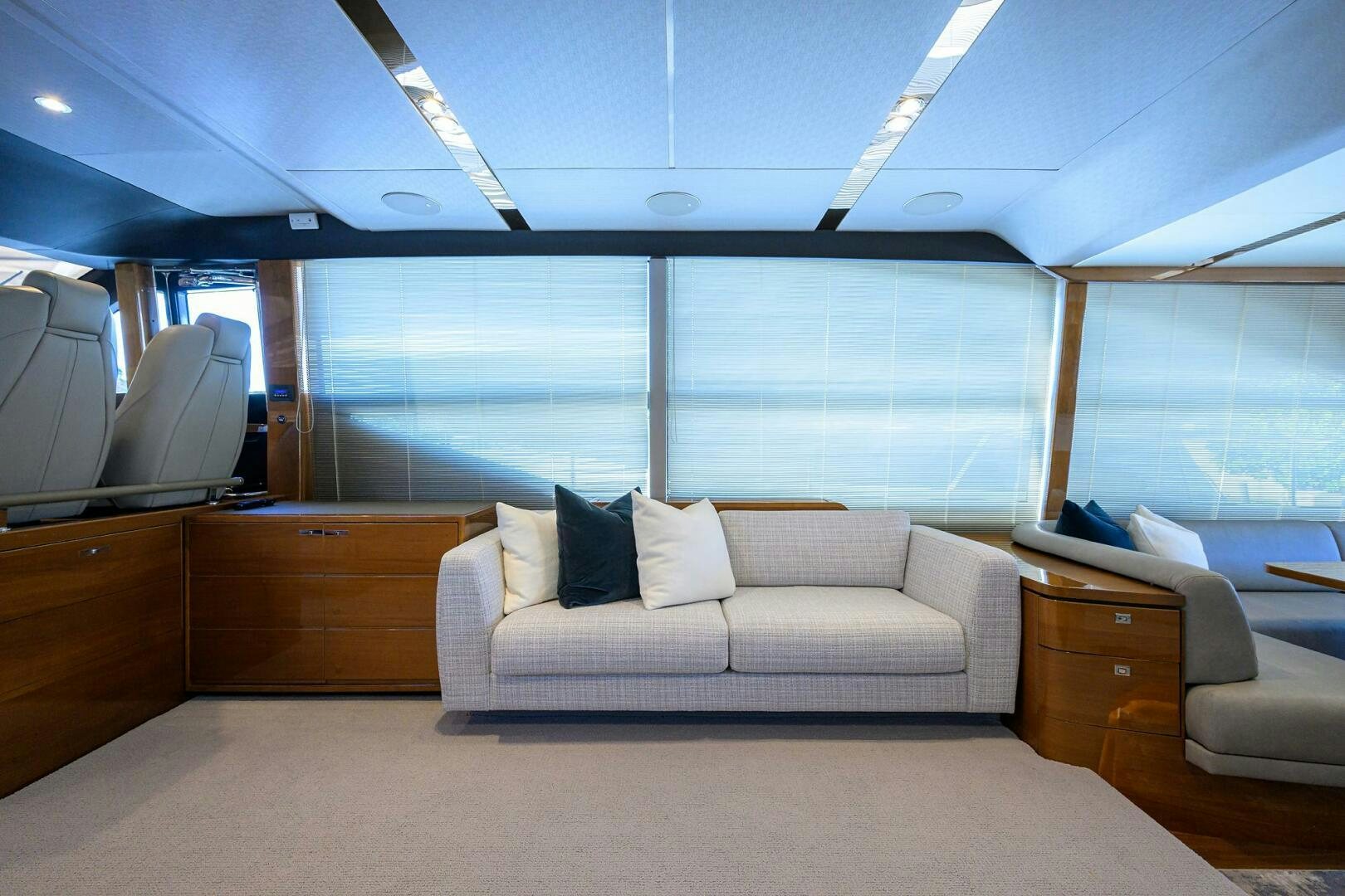 a room with a couch and a window aboard TWIST OF FAITH Yacht for Sale