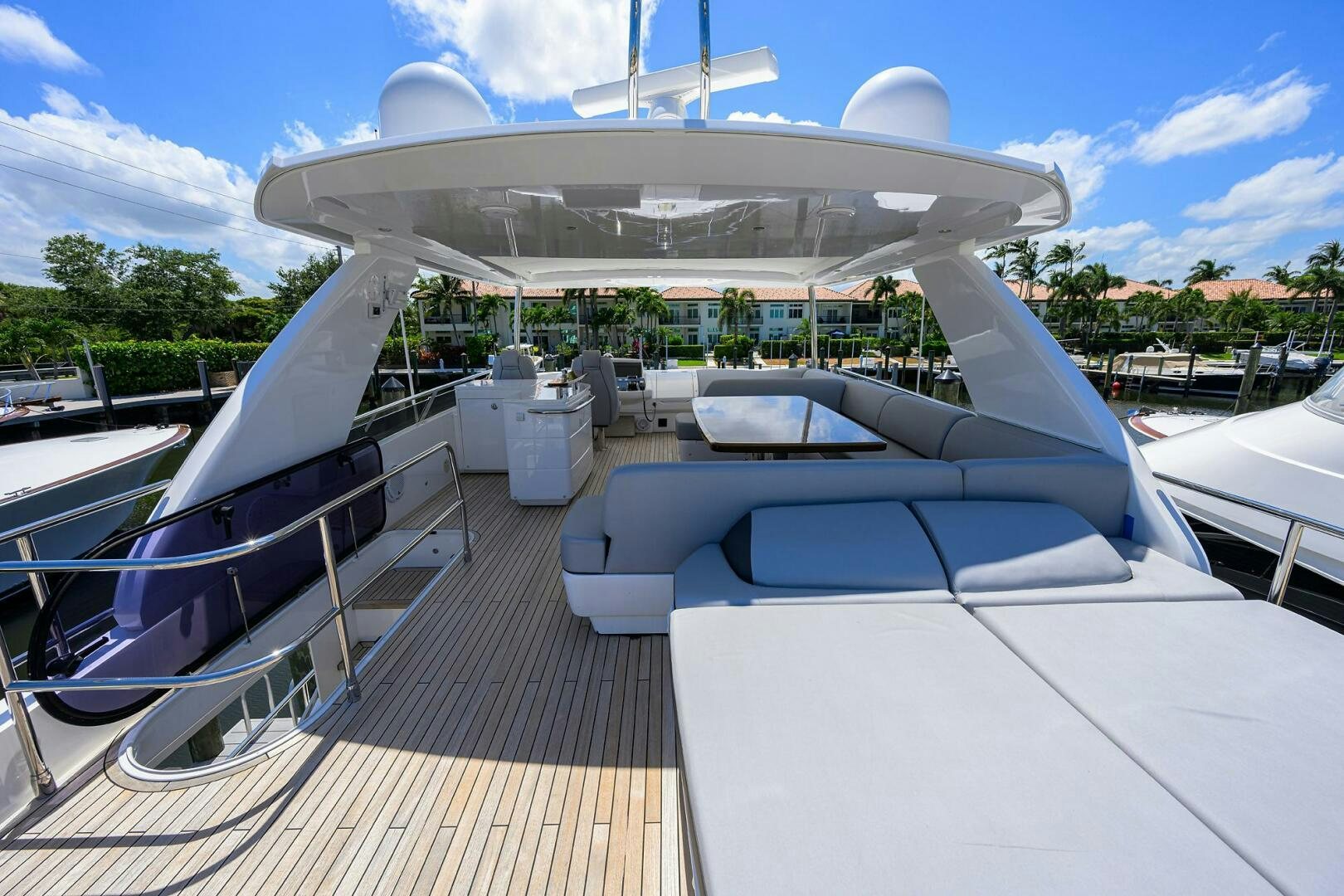 a deck with a row of boats aboard TWIST OF FAITH Yacht for Sale