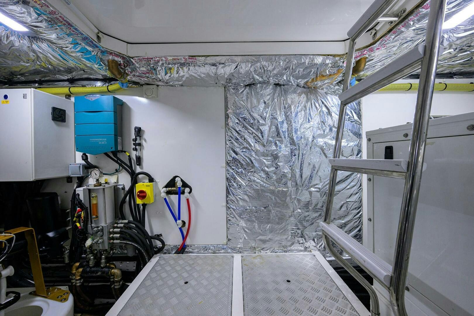 a room with machinery and equipment aboard TWIST OF FAITH Yacht for Sale