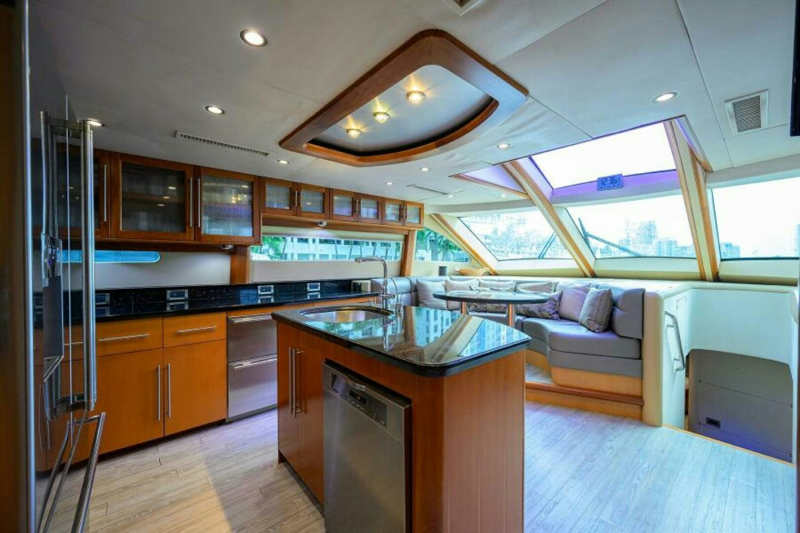 a kitchen with a large island aboard LIVING THE DREAM Yacht for Sale