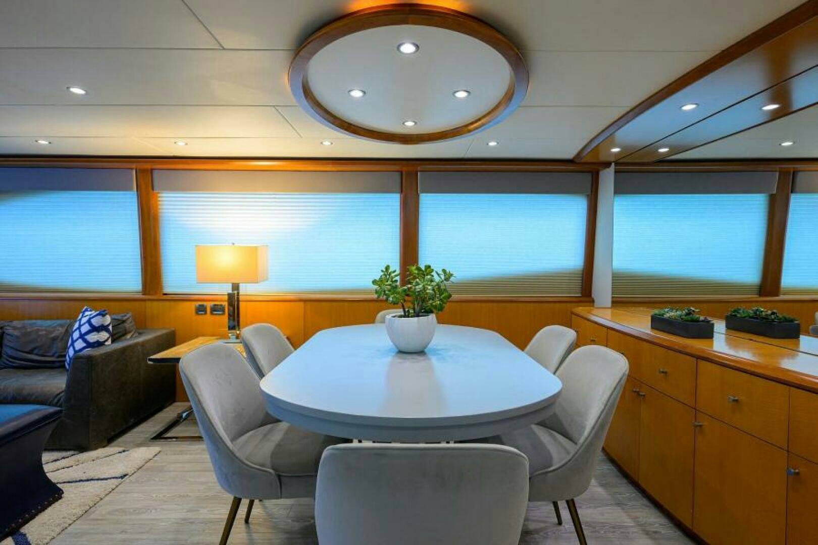 a room with a table and chairs aboard LIVING THE DREAM Yacht for Sale