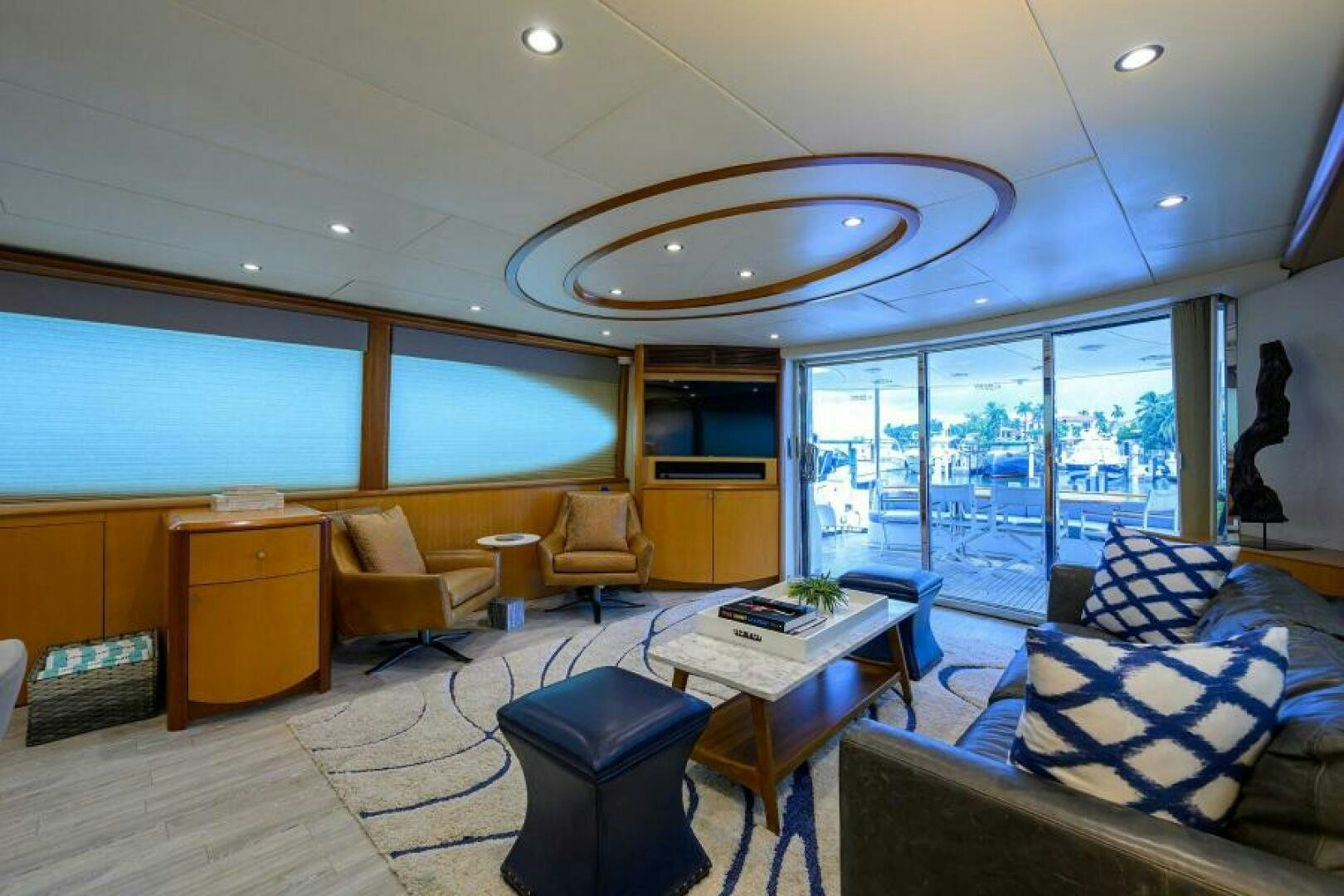 a room with a large window and a view of the city aboard LIVING THE DREAM Yacht for Sale