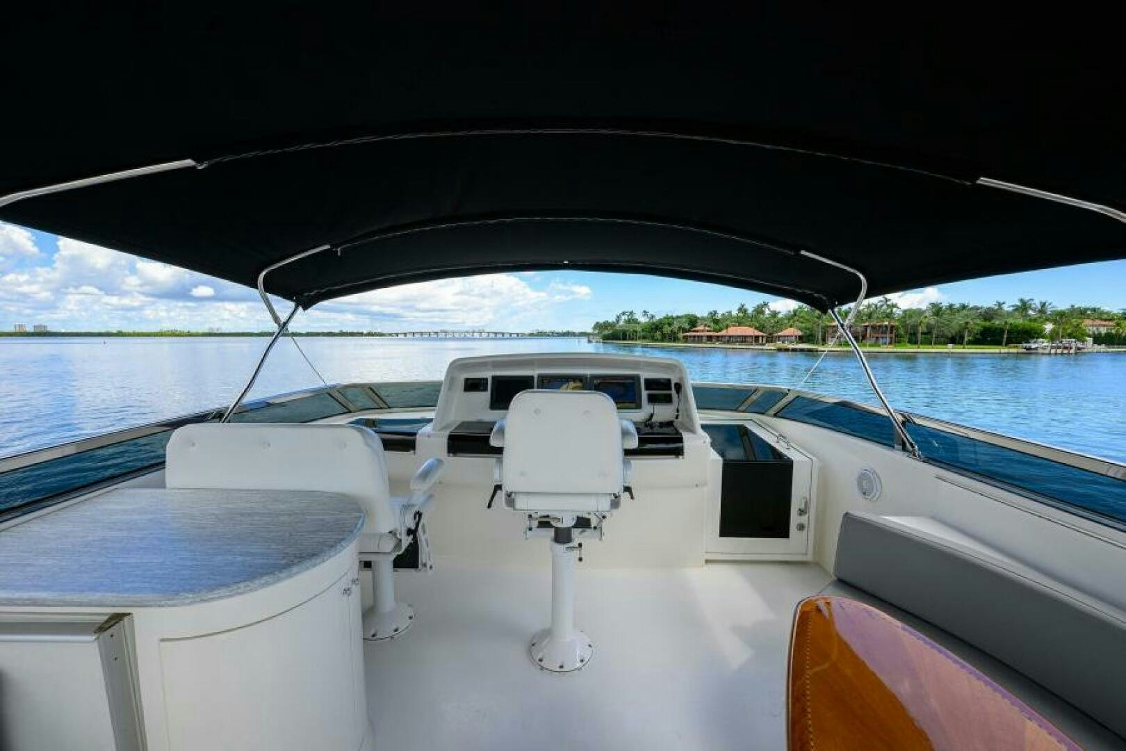 a boat with a view of the water and land below aboard LIVING THE DREAM Yacht for Sale