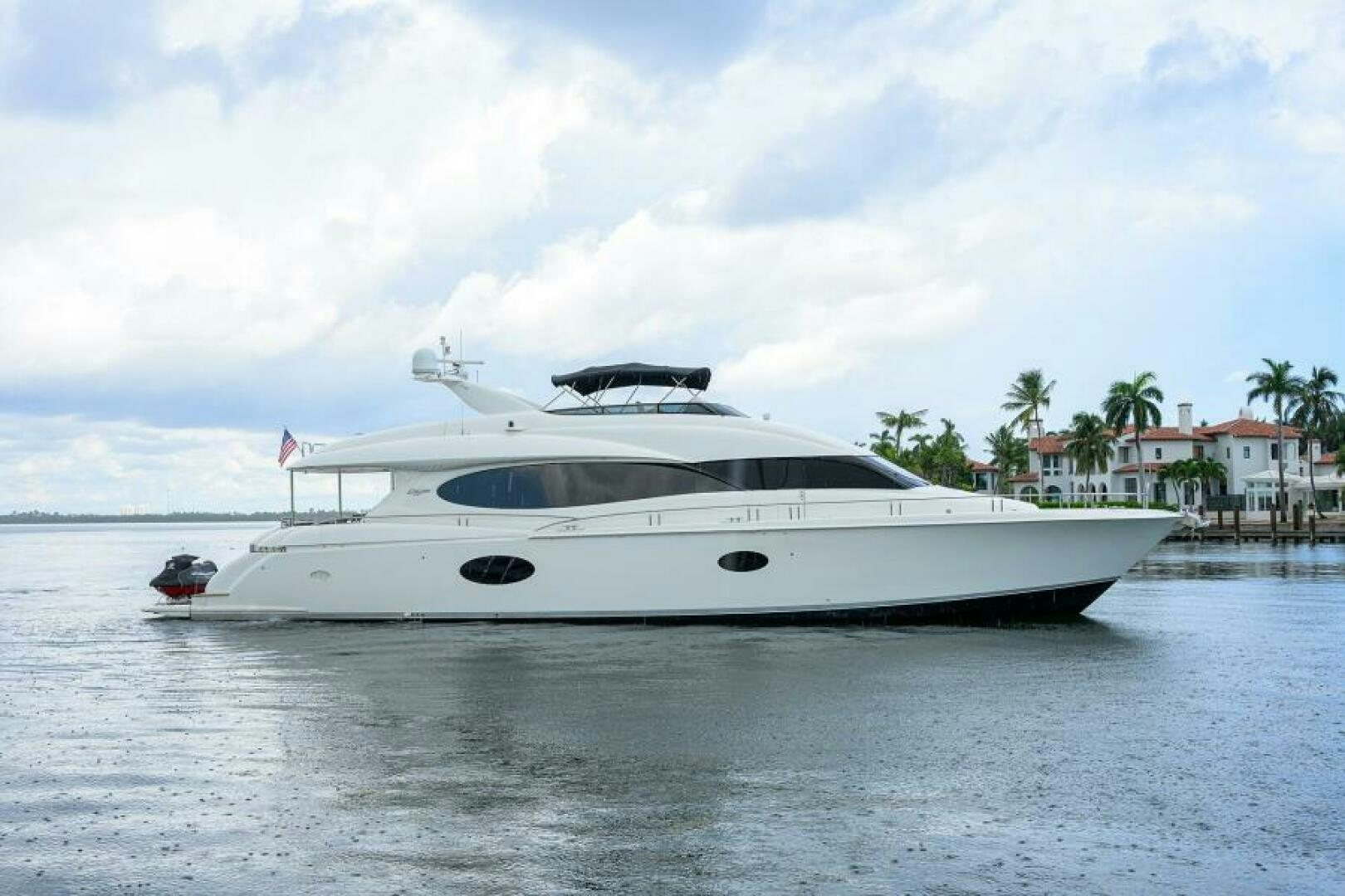 a white yacht on the water aboard LIVING THE DREAM Yacht for Sale