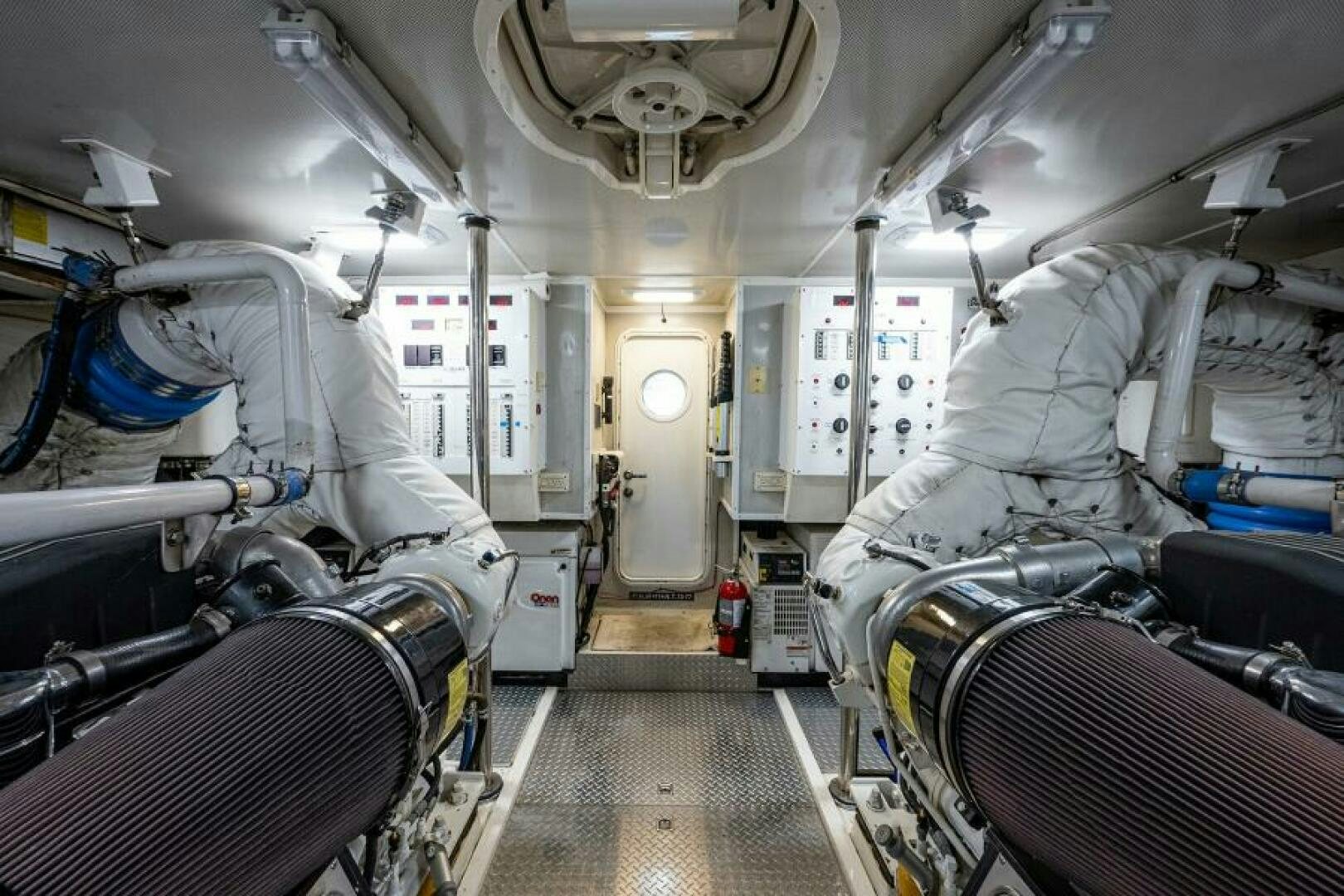 a room with a machine aboard LIVING THE DREAM Yacht for Sale
