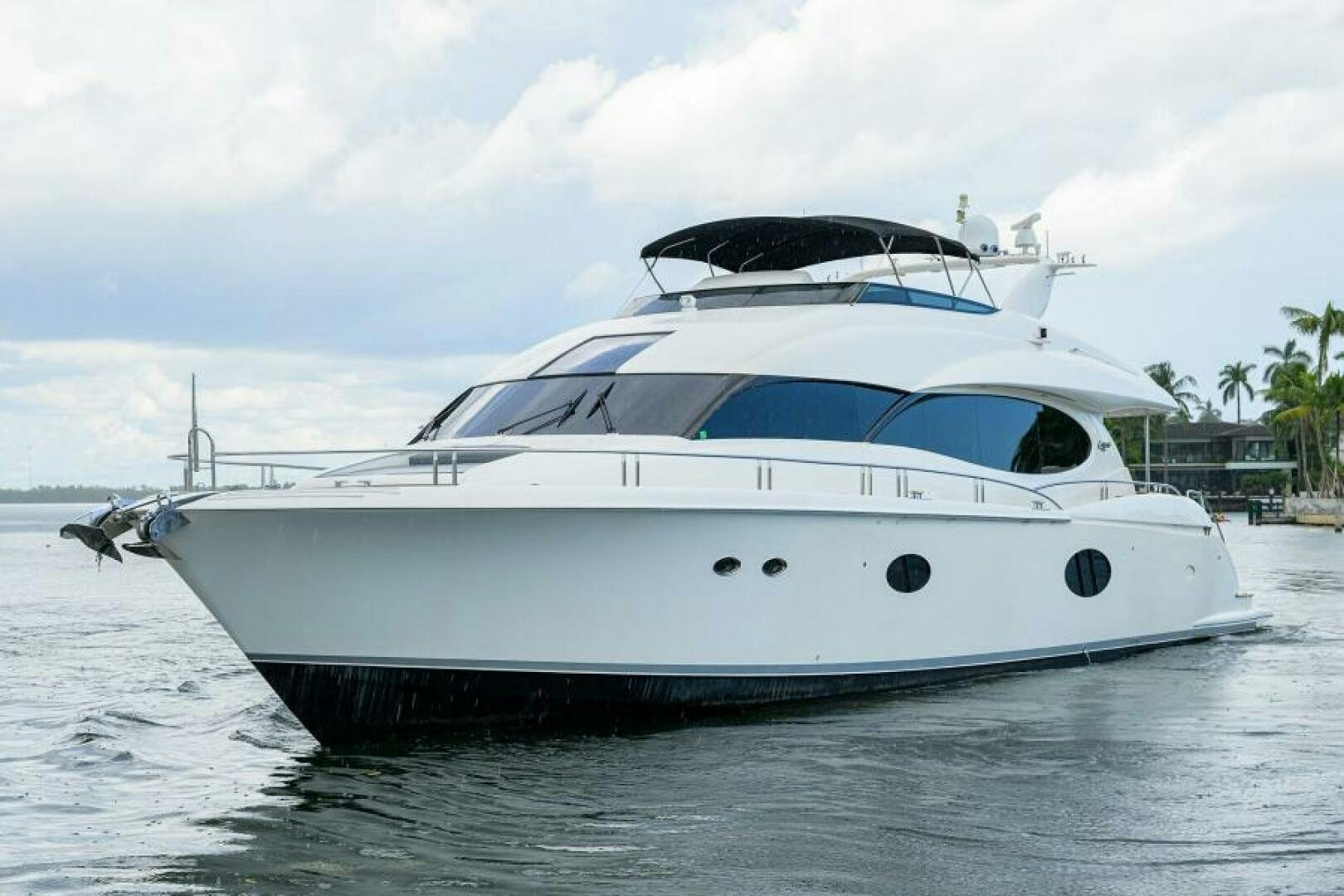 a white yacht in the water aboard LIVING THE DREAM Yacht for Sale
