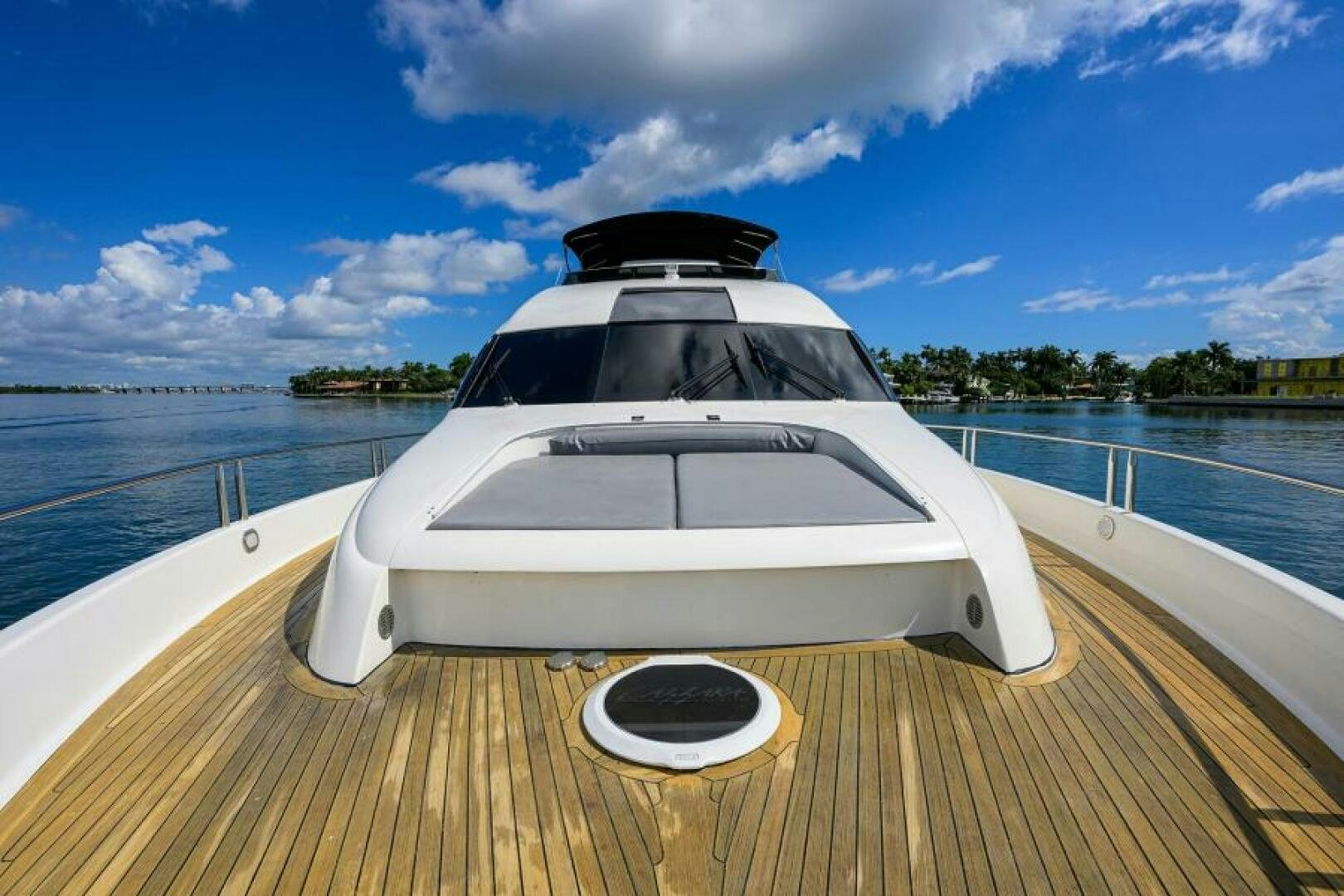a white car on a dock aboard LIVING THE DREAM Yacht for Sale