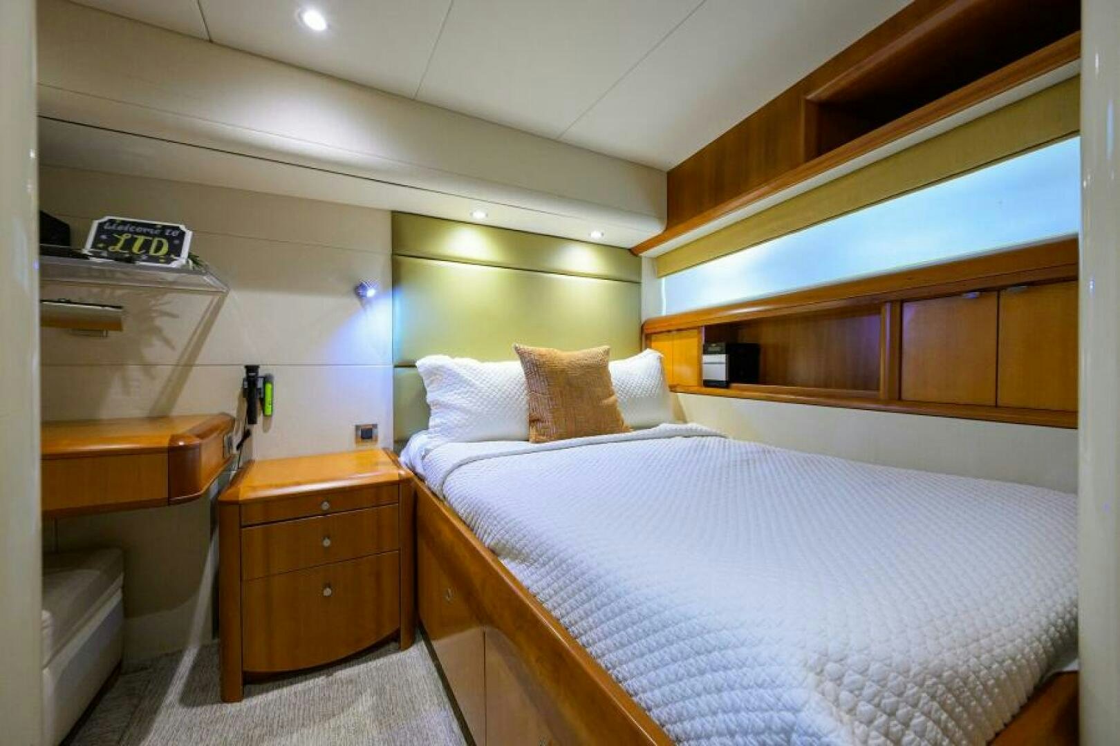 a room with two beds aboard LIVING THE DREAM Yacht for Sale