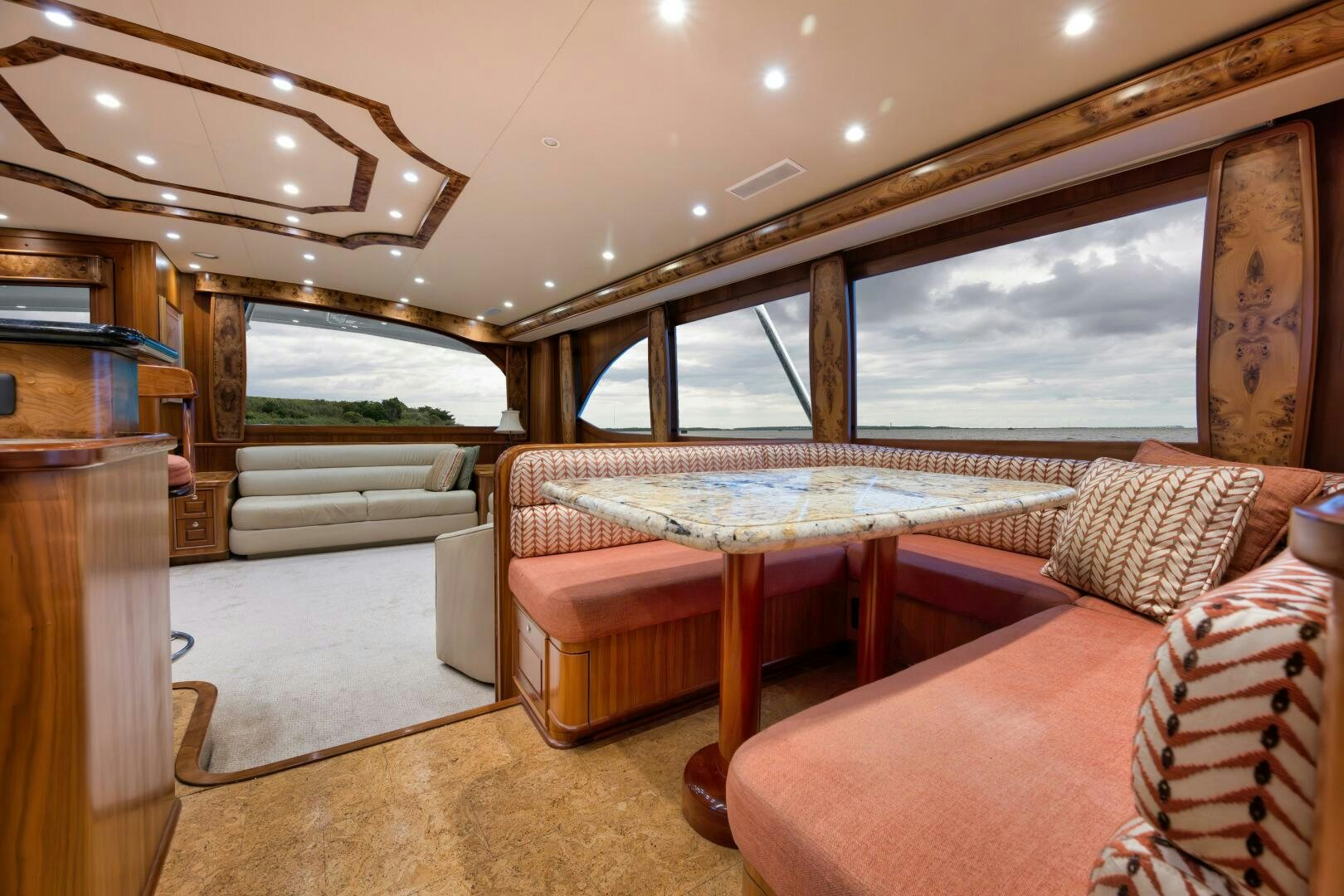 a room with a table and a bed aboard ANN WARRICK Yacht for Sale