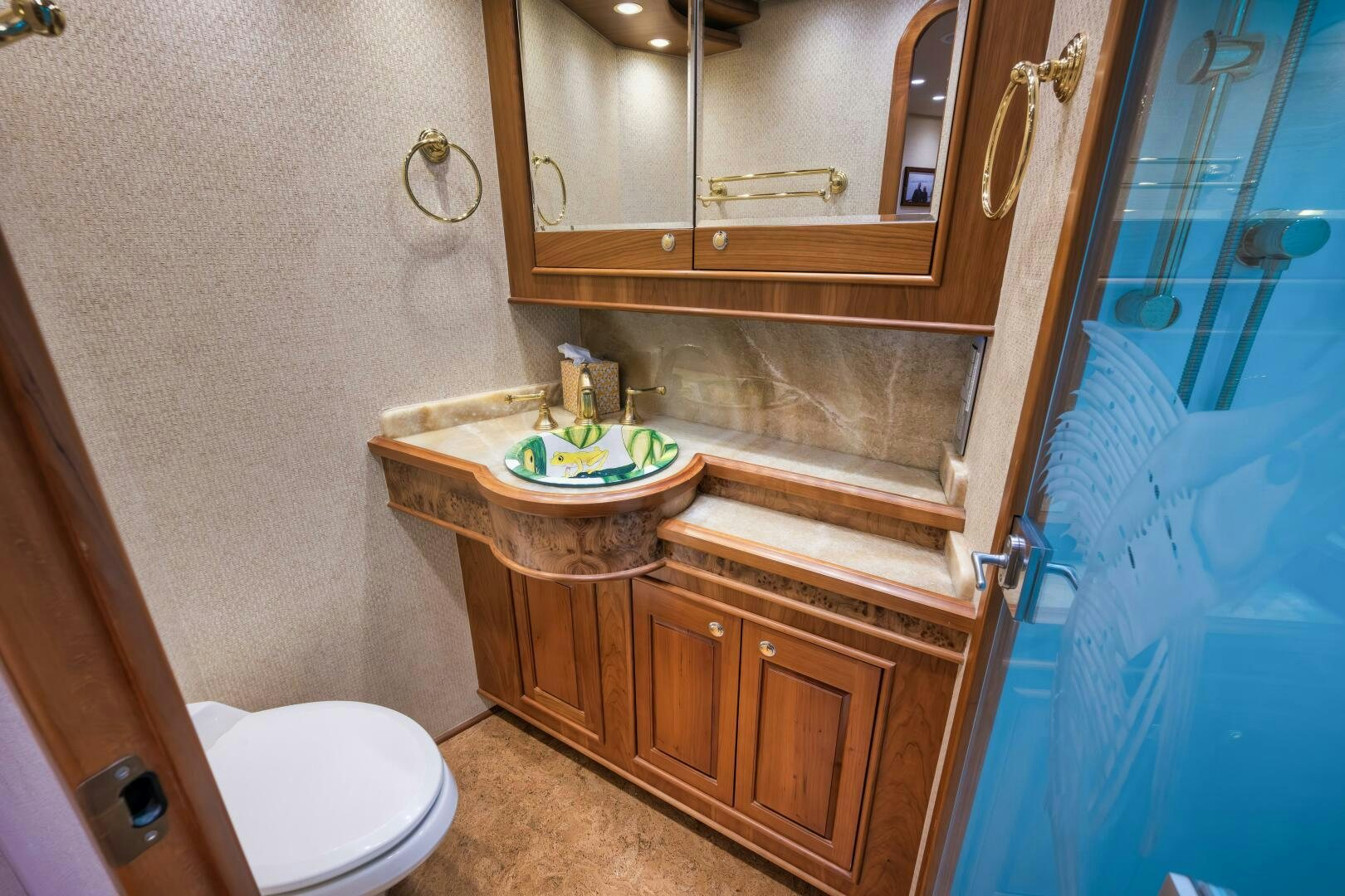 a bathroom with a sink and toilet aboard ANN WARRICK Yacht for Sale