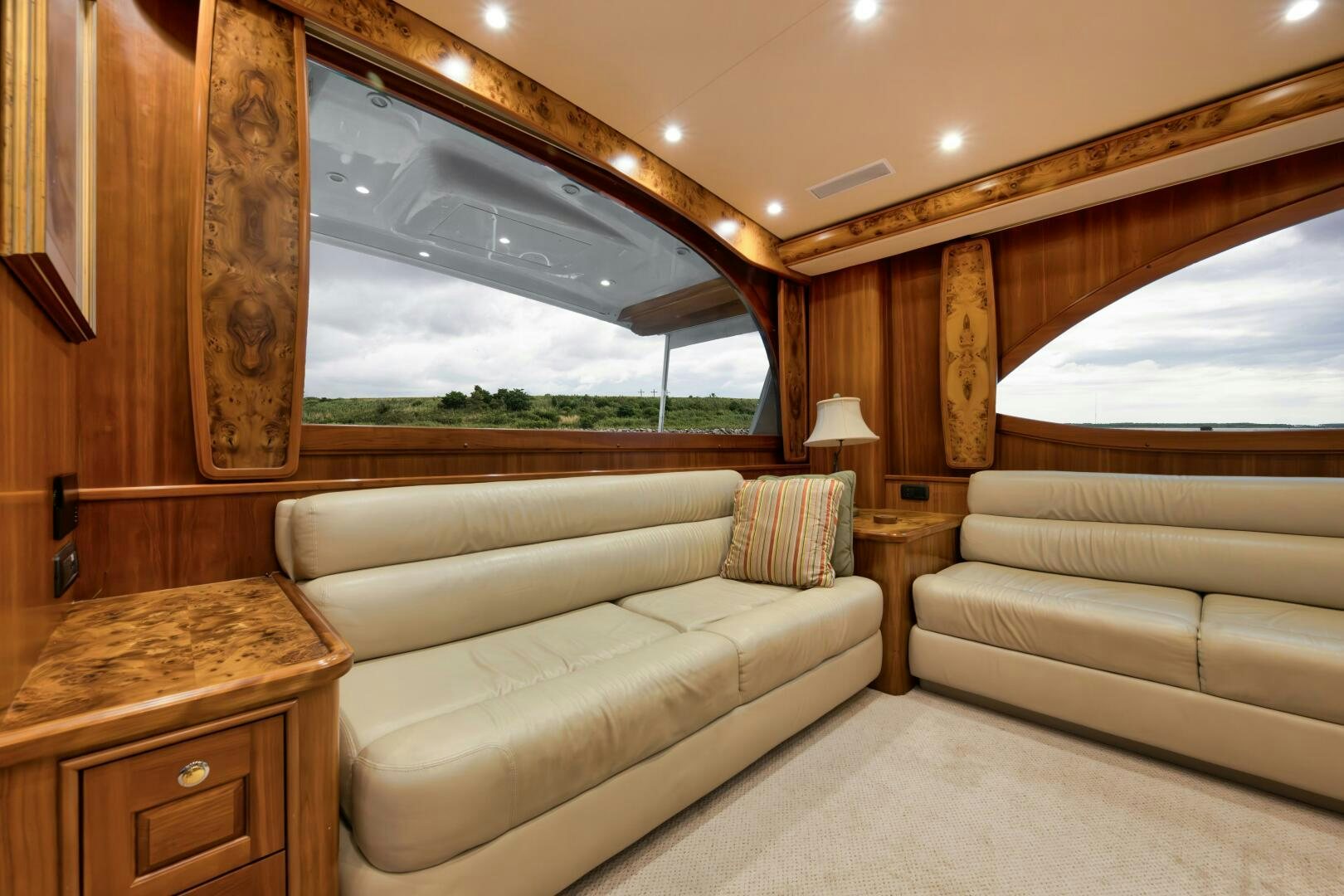 a living room with a large window aboard ANN WARRICK Yacht for Sale