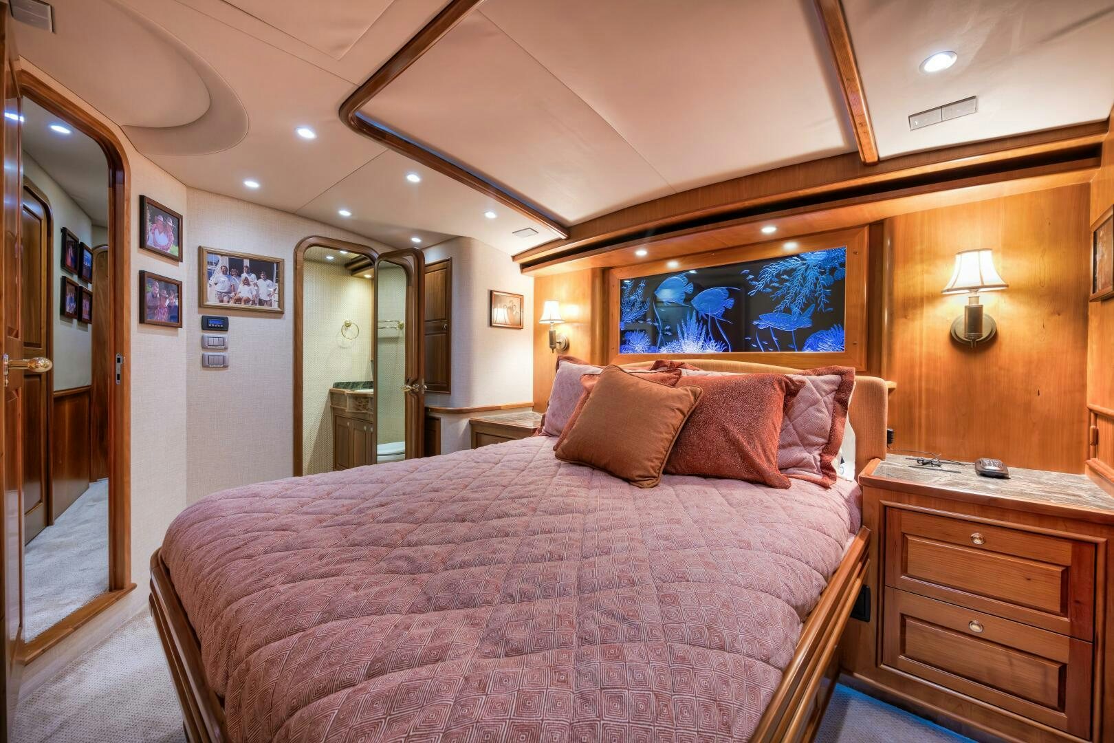 a bed with a pink comforter aboard ANN WARRICK Yacht for Sale
