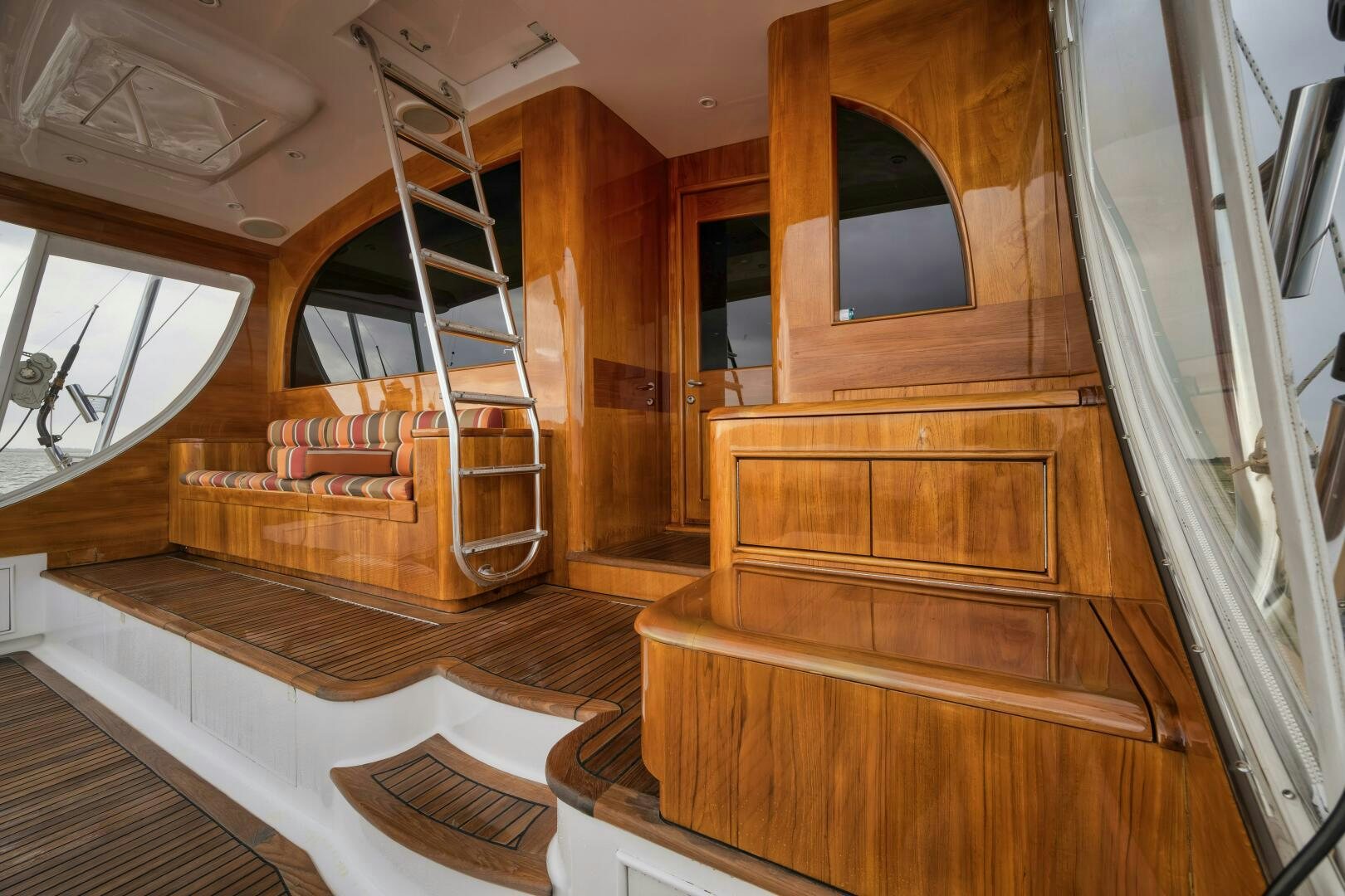 a wooden staircase in a house aboard ANN WARRICK Yacht for Sale