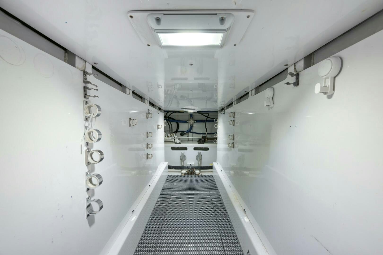 a long hallway with a light aboard ANN WARRICK Yacht for Sale