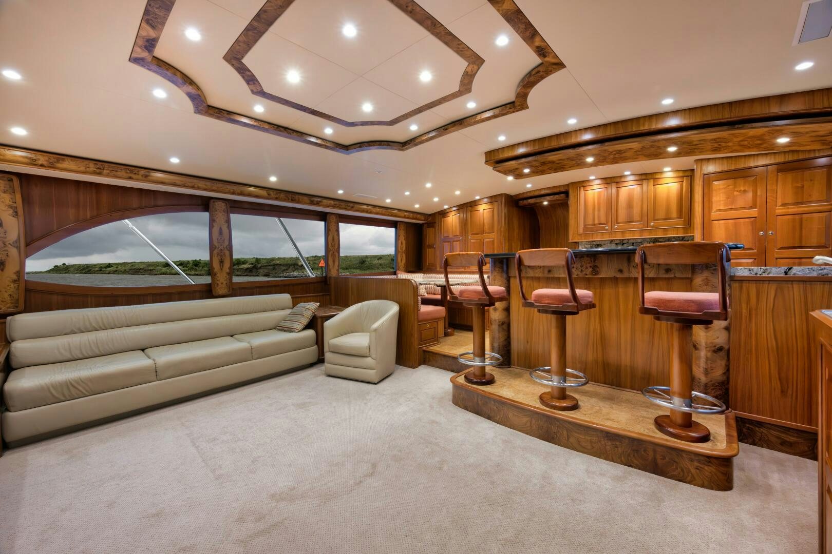 a living room with a couch and a table aboard ANN WARRICK Yacht for Sale