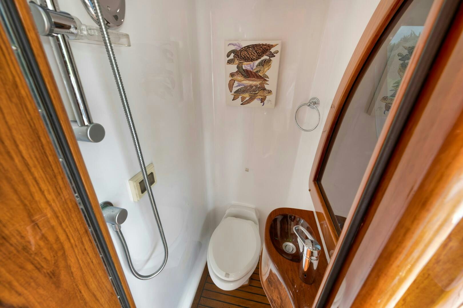 a bathroom with a shower and a toilet aboard ANN WARRICK Yacht for Sale